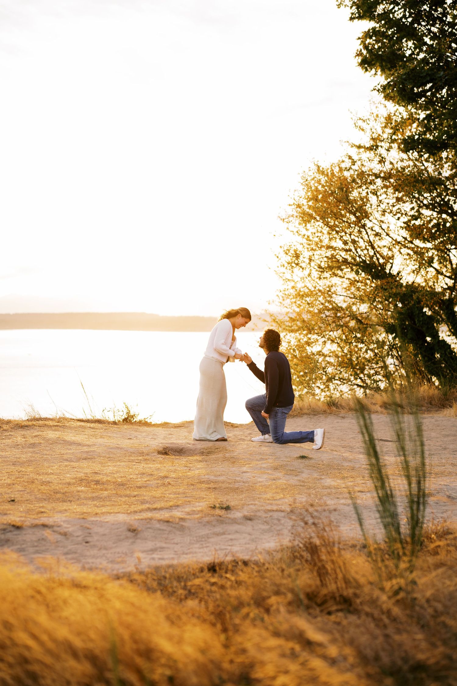 Proposing at golden hour above Puget Sound, Discovery Park proposal photographer, Seattle