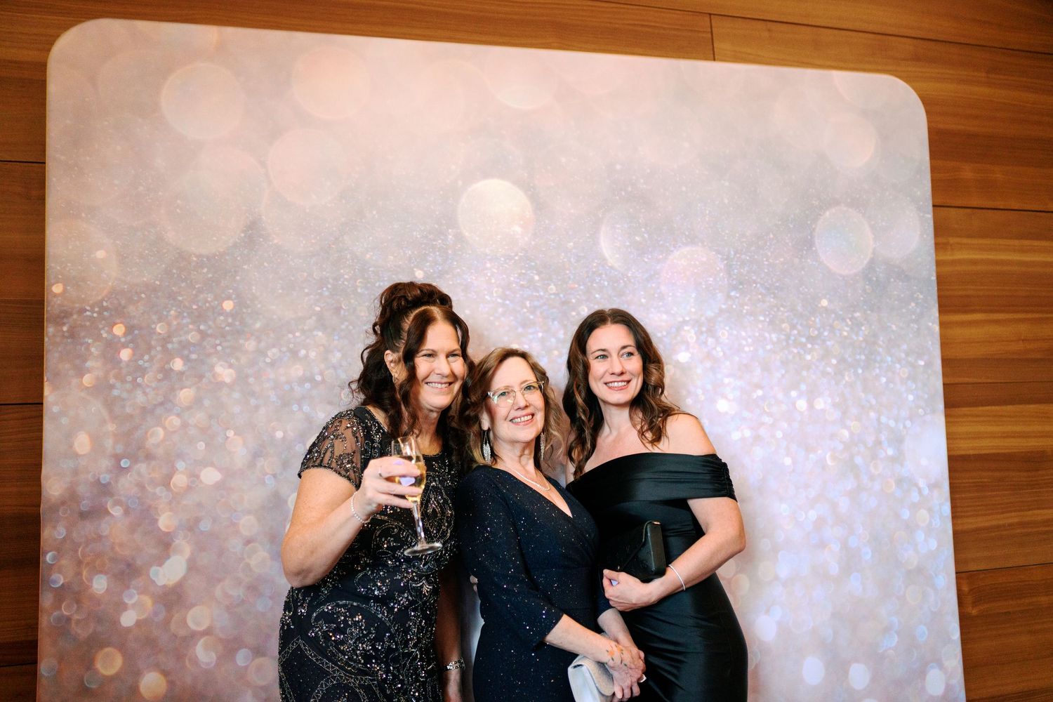Three guests at the selfie booth backdrop, Hyatt Regency Lake Washington event photographer, Renton