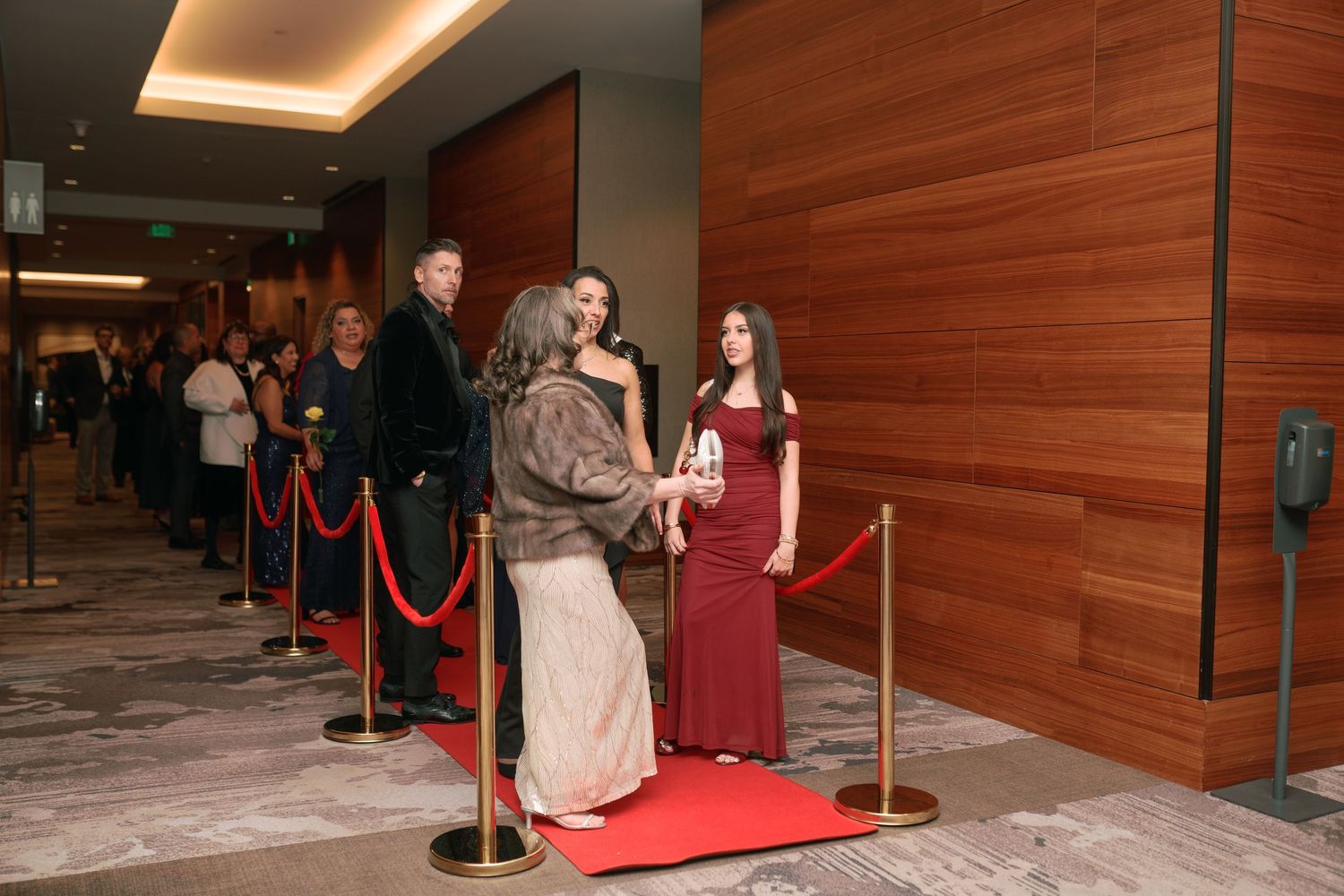Guests lining up at the red carpet entrance, corporate gala photographer at the Hyatt Regency Lake Washington, Renton