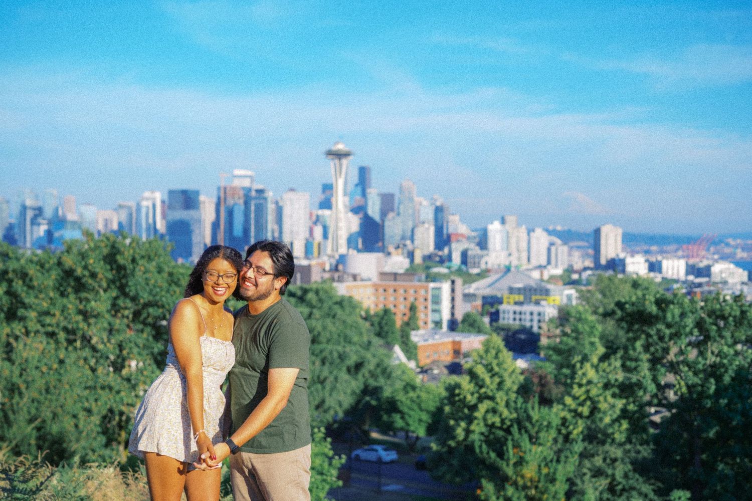 First embrace after the yes at the Kerry Park railing, Seattle proposal photographer