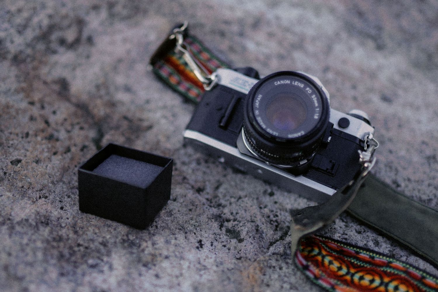 Film camera and the empty ring box on the rock, Artist Point proposal photographer, Mt Baker