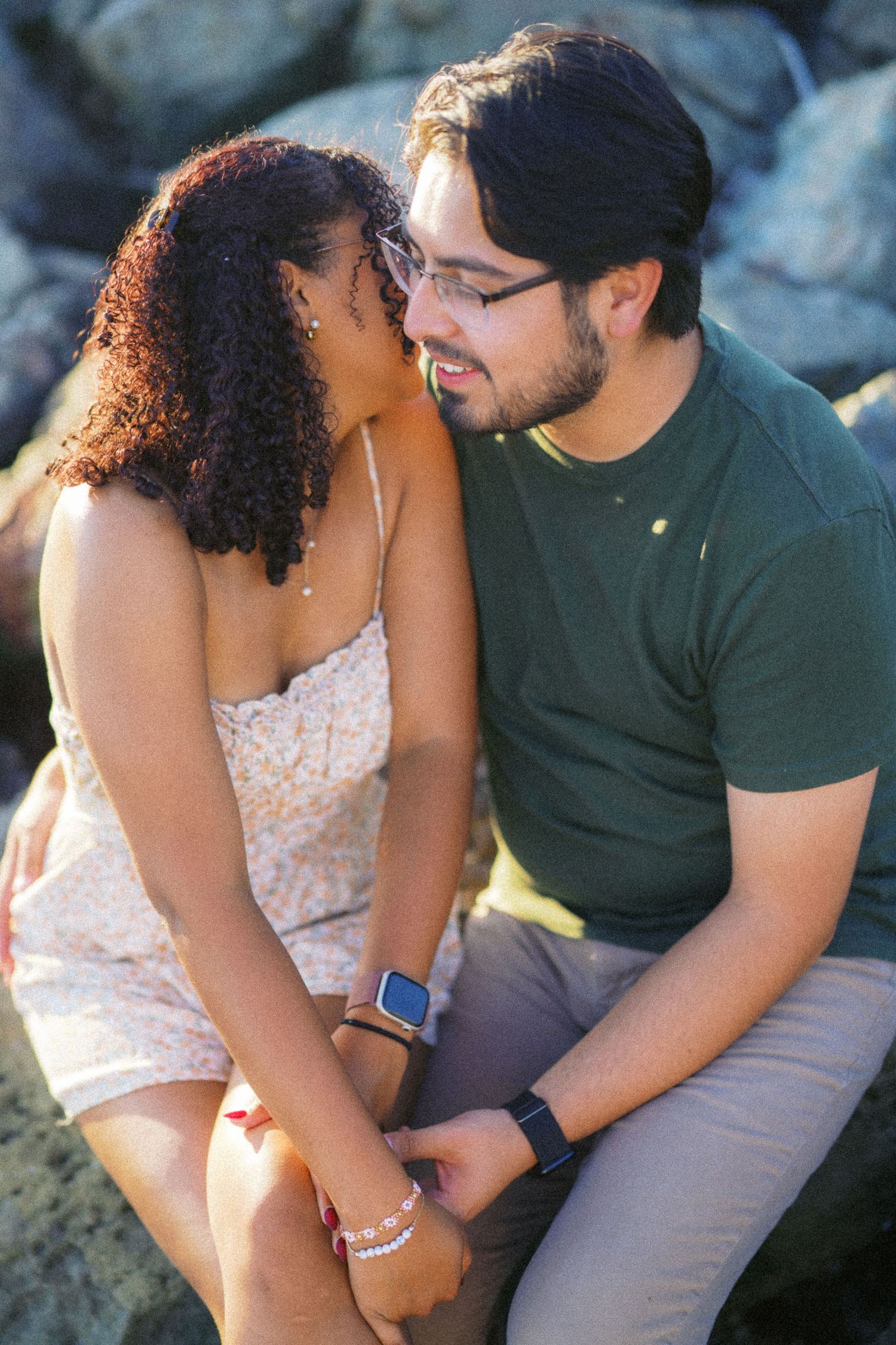 Sitting together on the rocks after the proposal, Seattle proposal photography