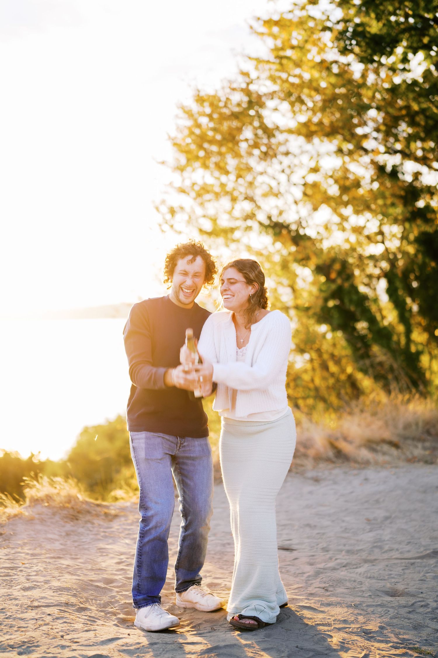 Engagement portrait among the trees after the proposal, Discovery Park proposal photographer, Seattle