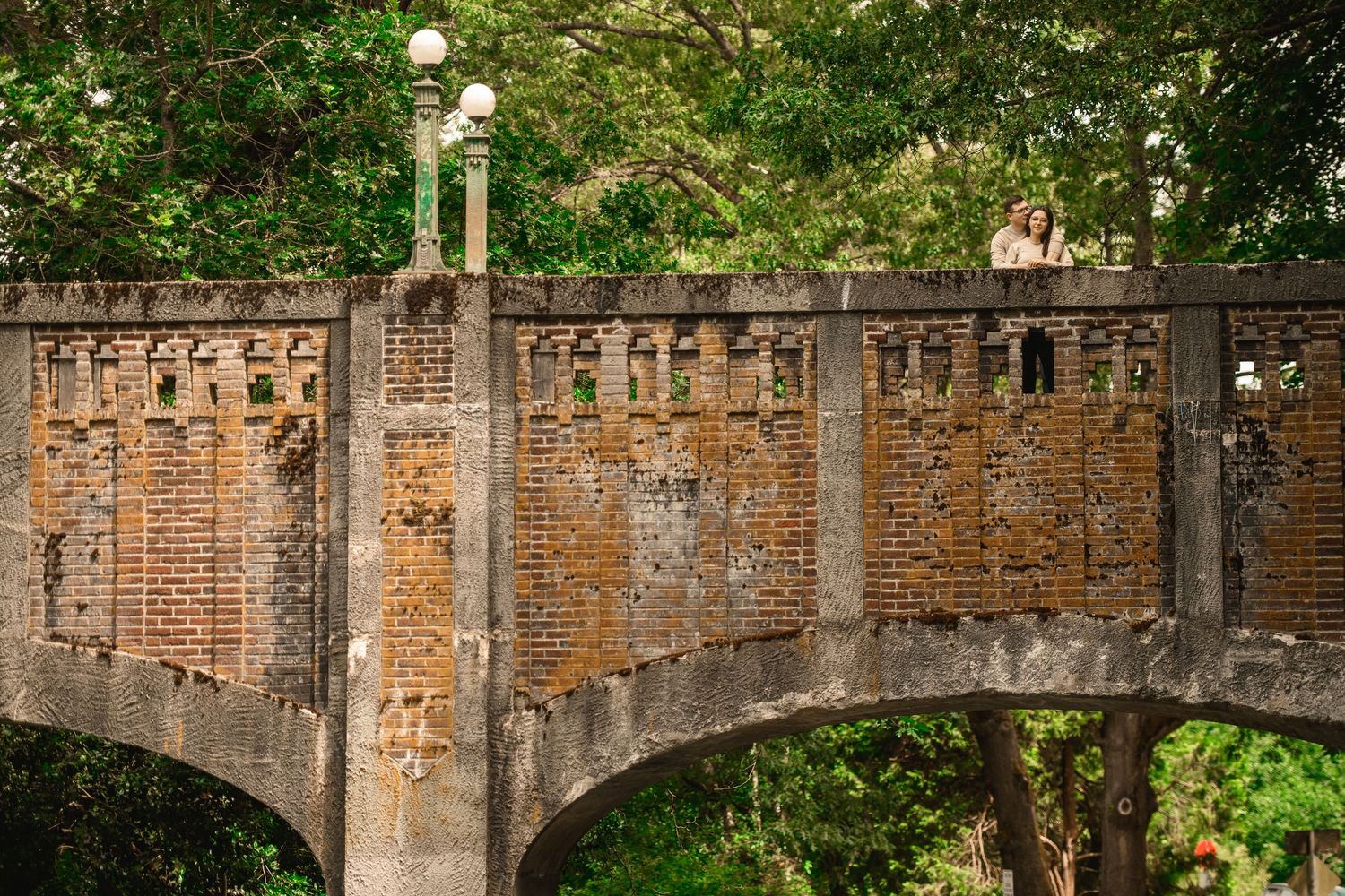 The stone arch of the Wilcox Footbridge over Lake Washington Boulevard, Washington Park Arboretum proposal photographer, Seattle