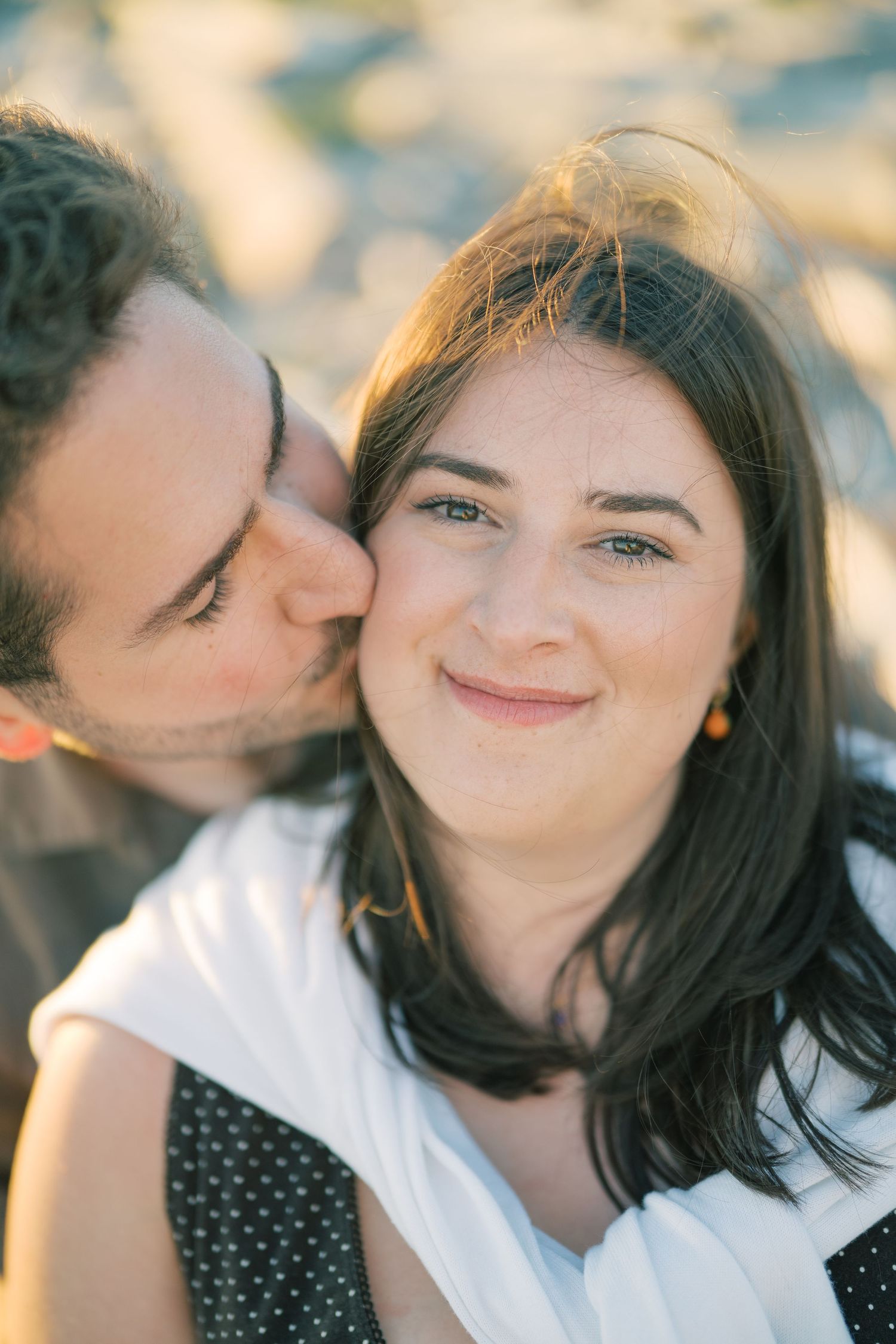 He kisses her cheek at the end of the session, Whidbey Island proposal photographer, Freeland