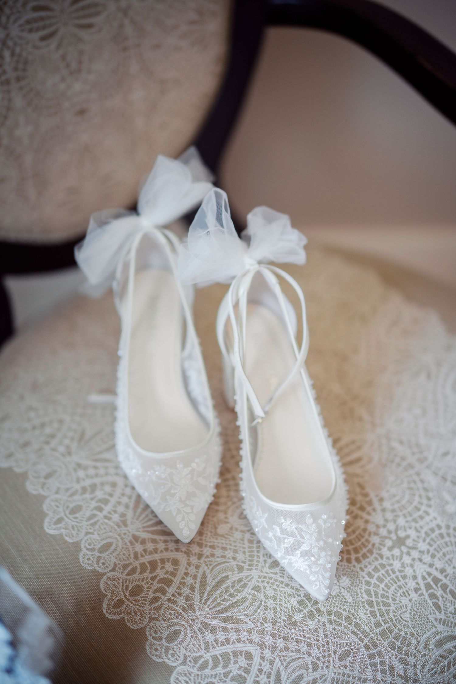 White lace bridal heels before a Kelley Farm wedding in Bonney Lake