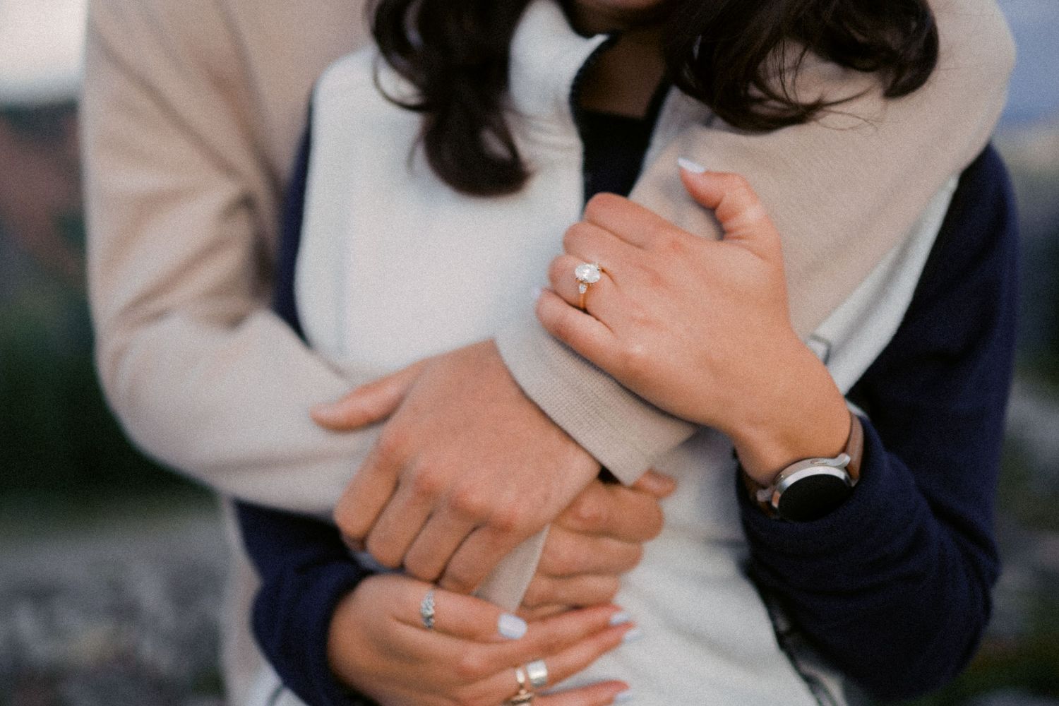 The new ring on her hand as he holds her, Artist Point proposal photographer, Mt Baker