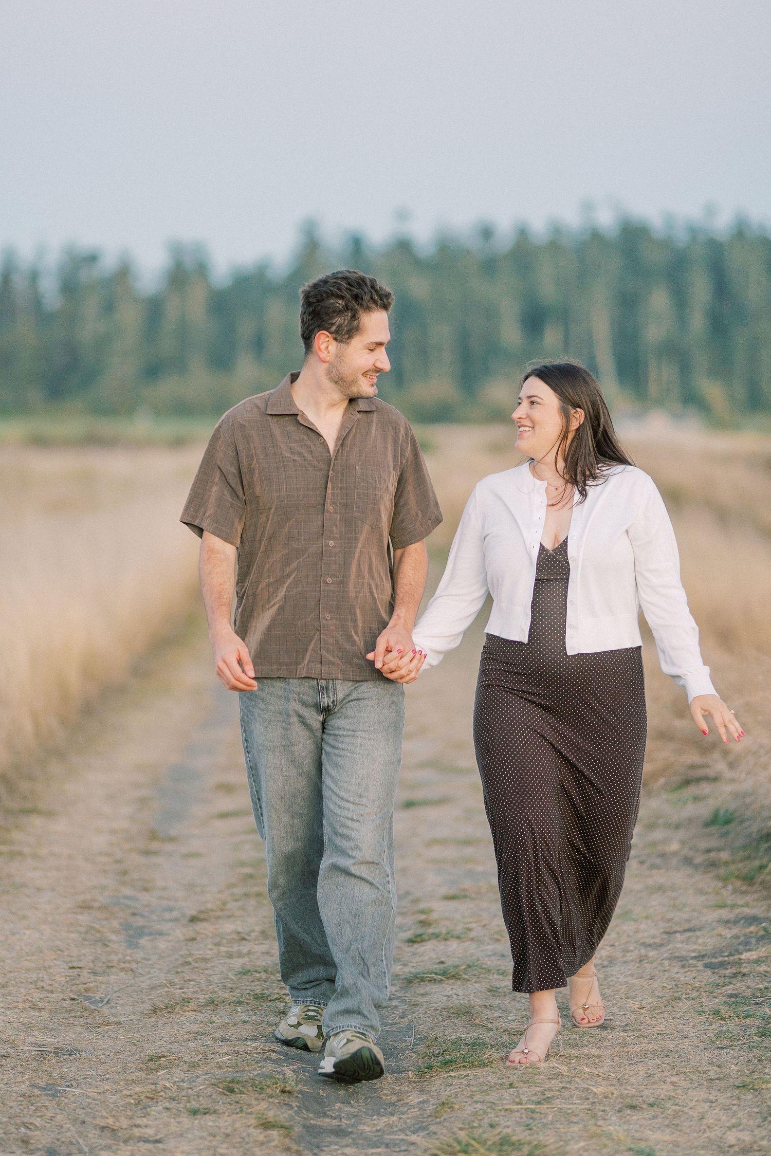 Walking the bluff path above the beach before sunset, Whidbey Island proposal photographer, Freeland WA
