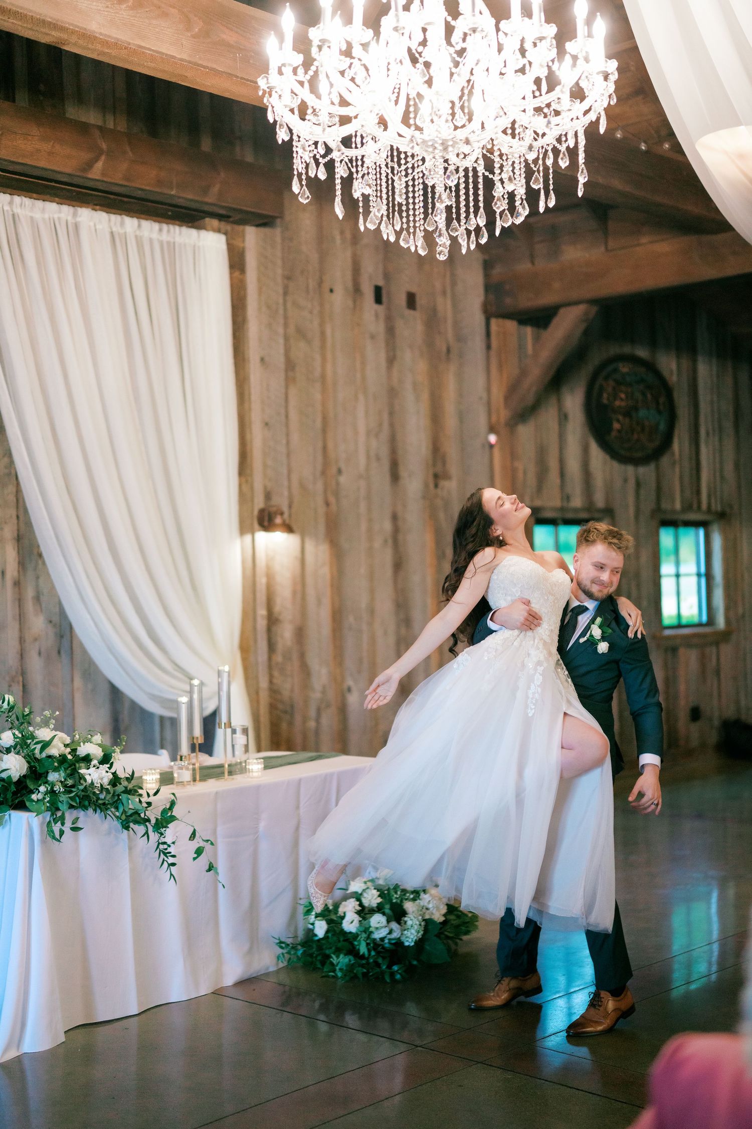 First dance under the chandelier in the barn at The Kelley Farm, Bonney Lake