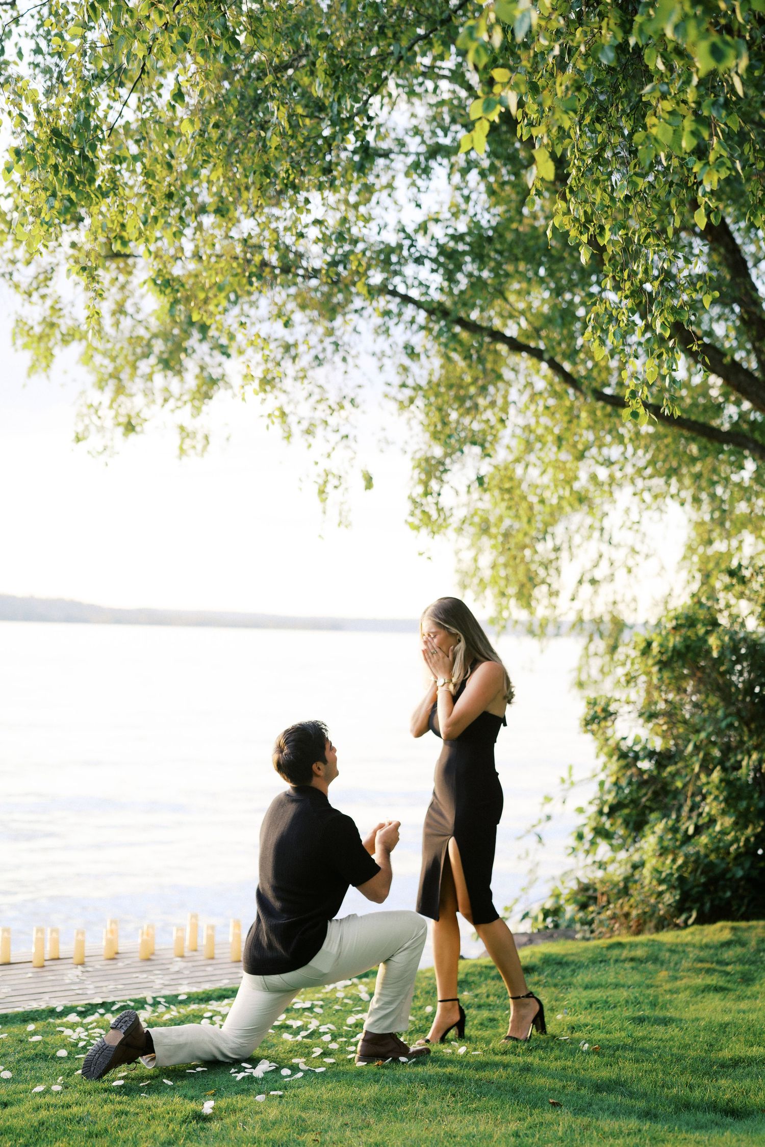 The two of them by the water after the proposal at Carillon Point, Carillon Point proposal photographer, Kirkland