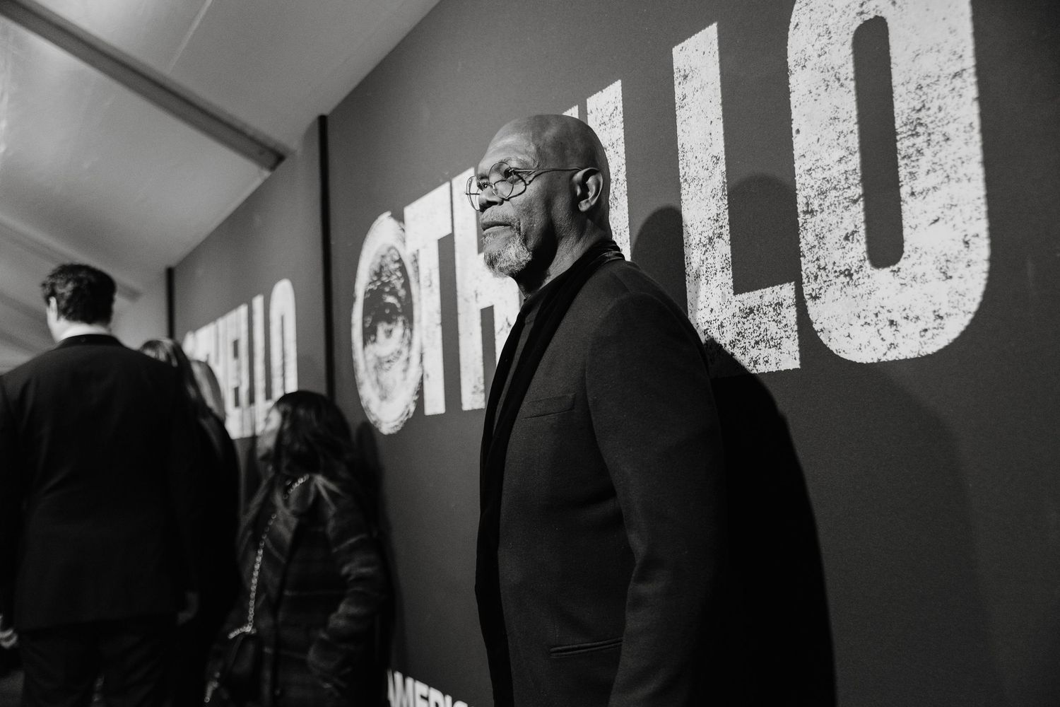 Samuel L Jackson at Othello, interior hallway with illuminated text on the wall.