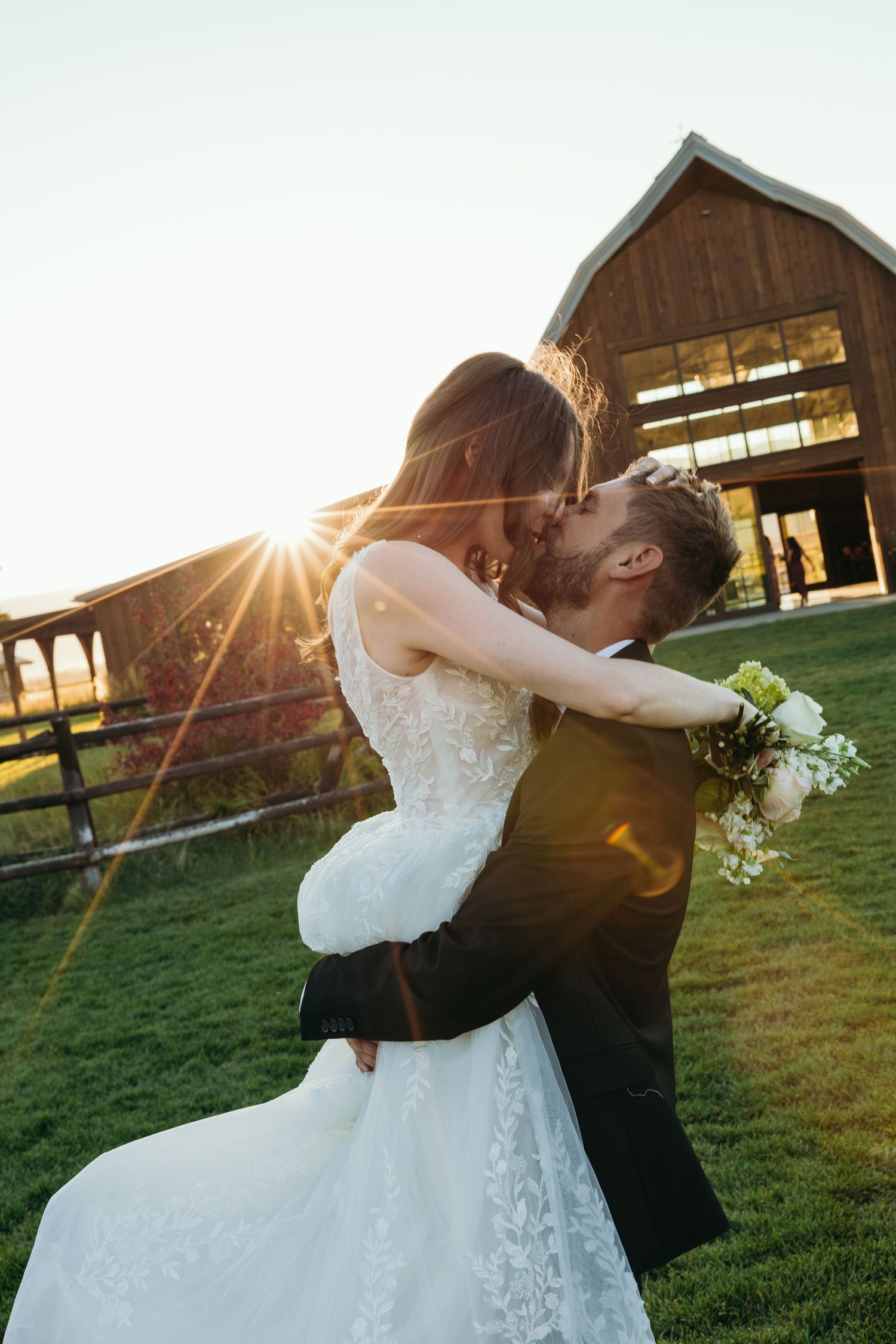 A romantic dance sequence captured at golden hour with a rustic barn setting.