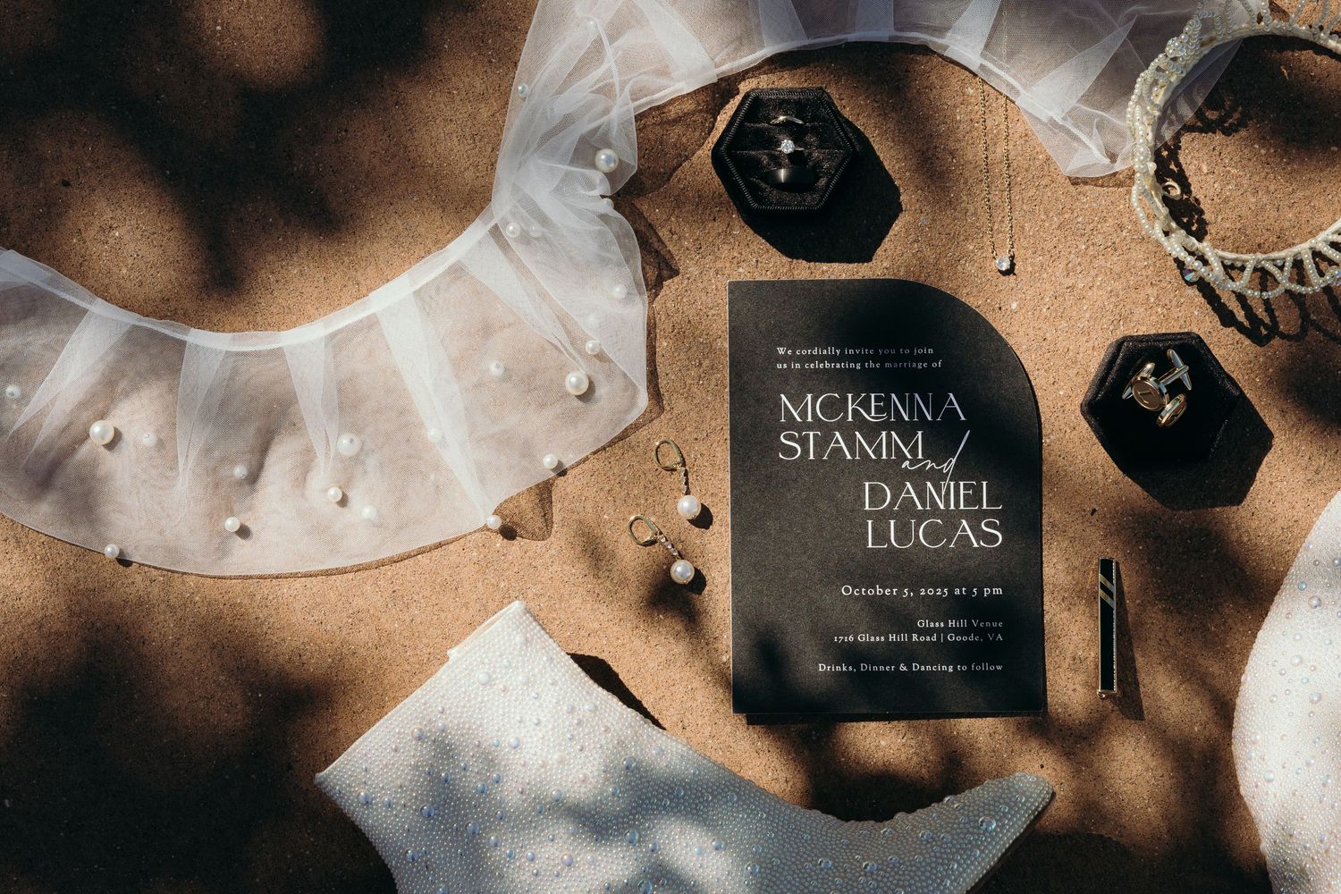 Modern wedding stationery with dark moody lighting and geometric design elements.