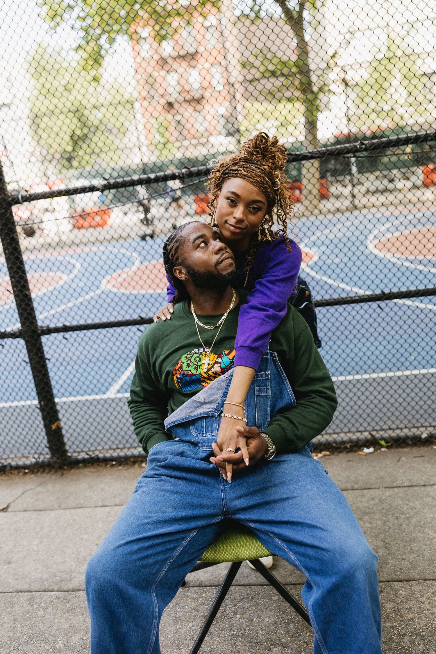 Casual portrait series of two people sitting together outdoors.