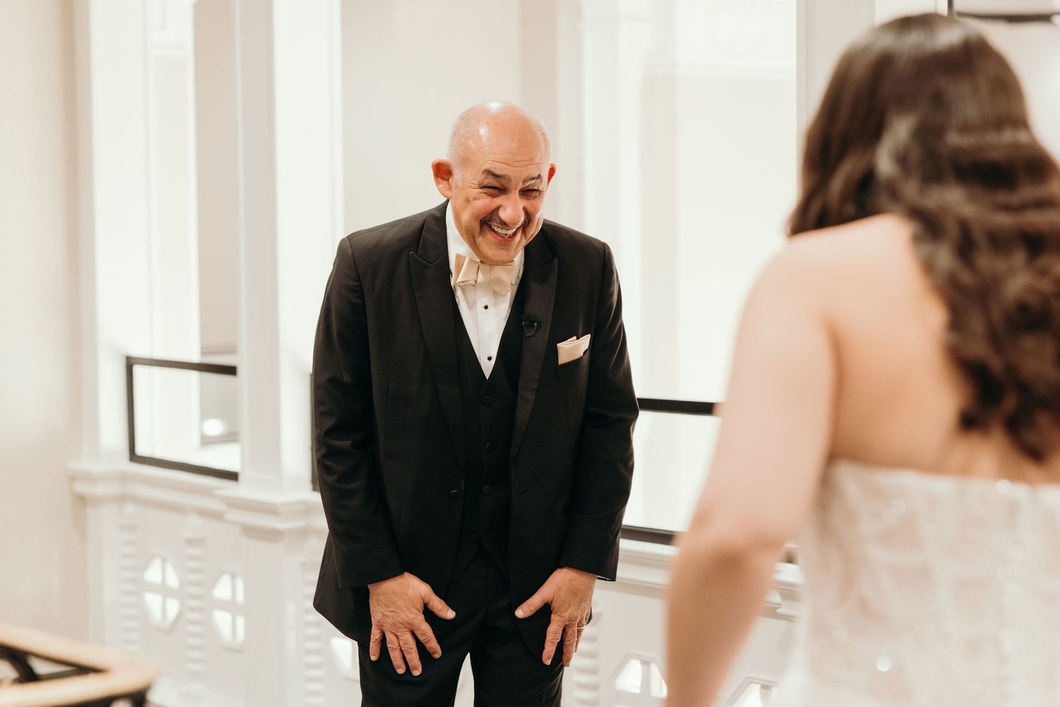 A heartwarming first look moment captured at a wedding as emotions overflow during the special reveal.