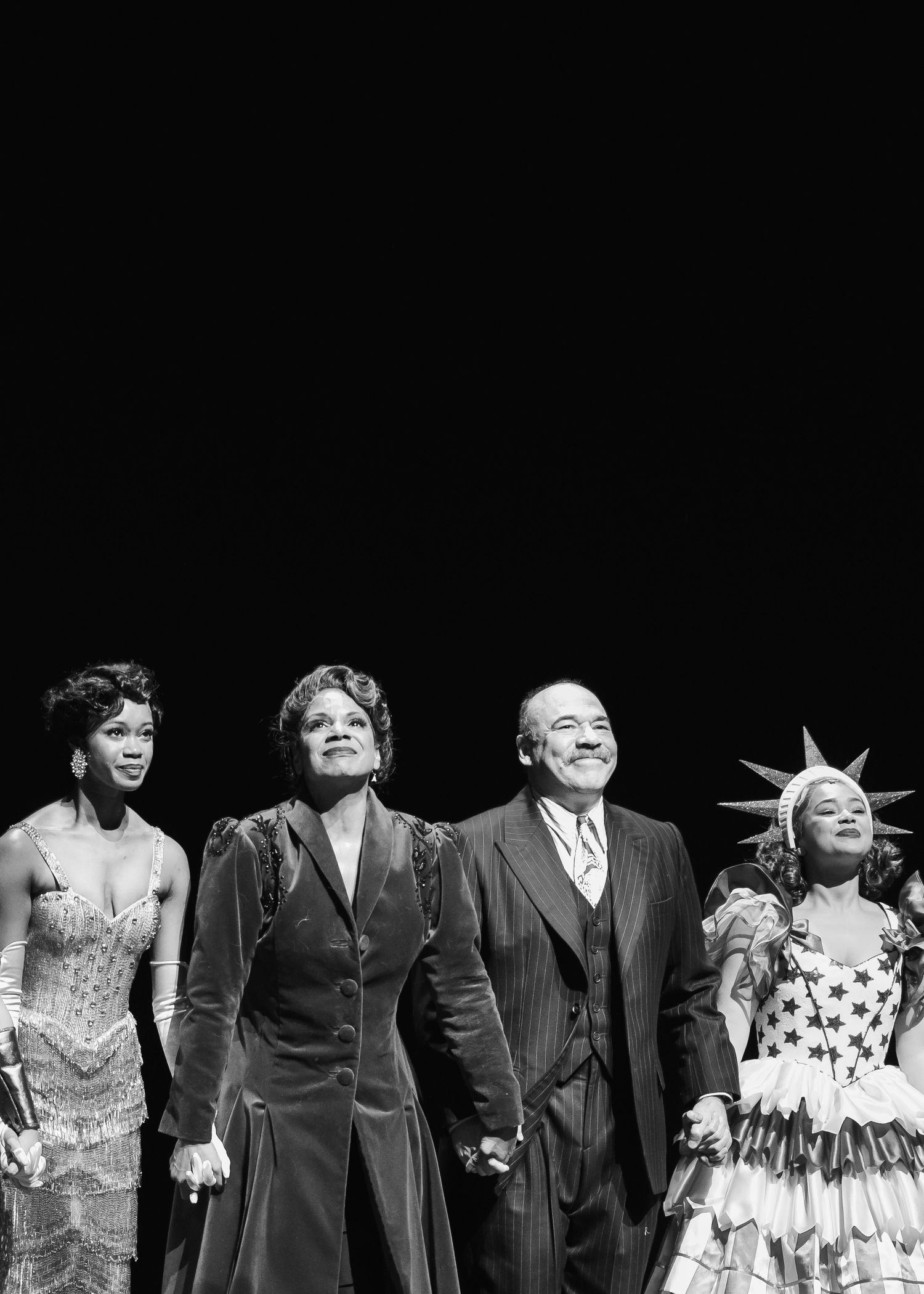 Theater performers Joy Woods, Jordan Tyson, Audra Mcdonald, and danny Burnstein taking a bow on stage at Gypsy