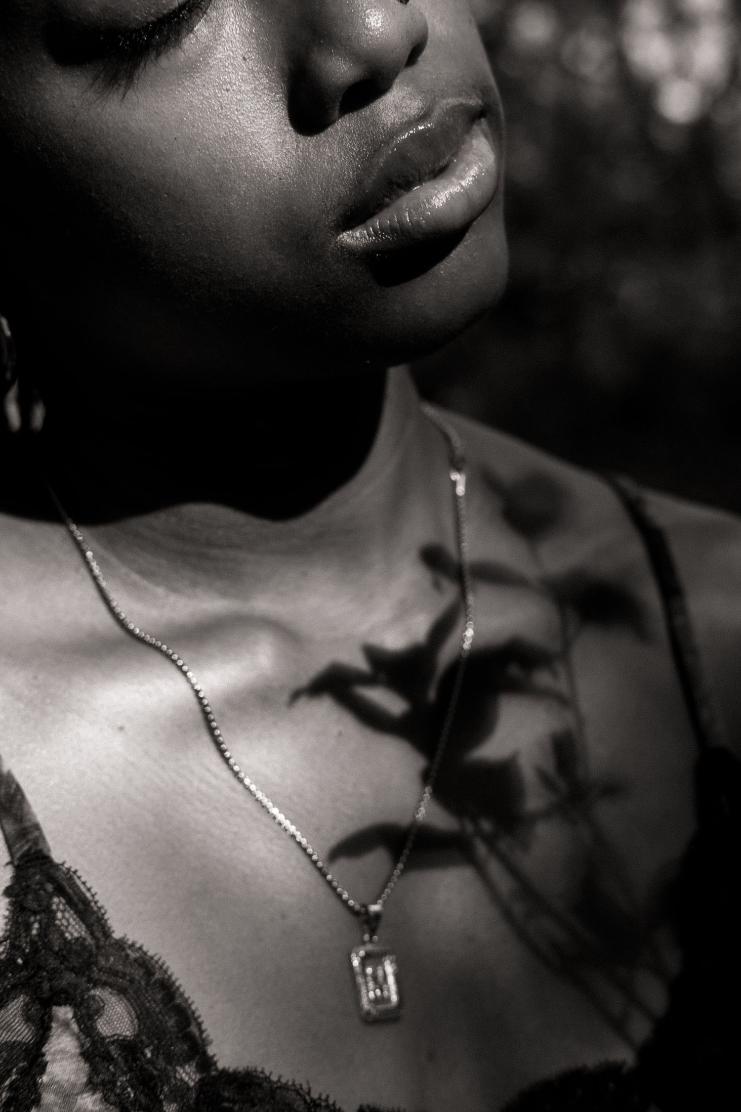 shadows of plant on woman
