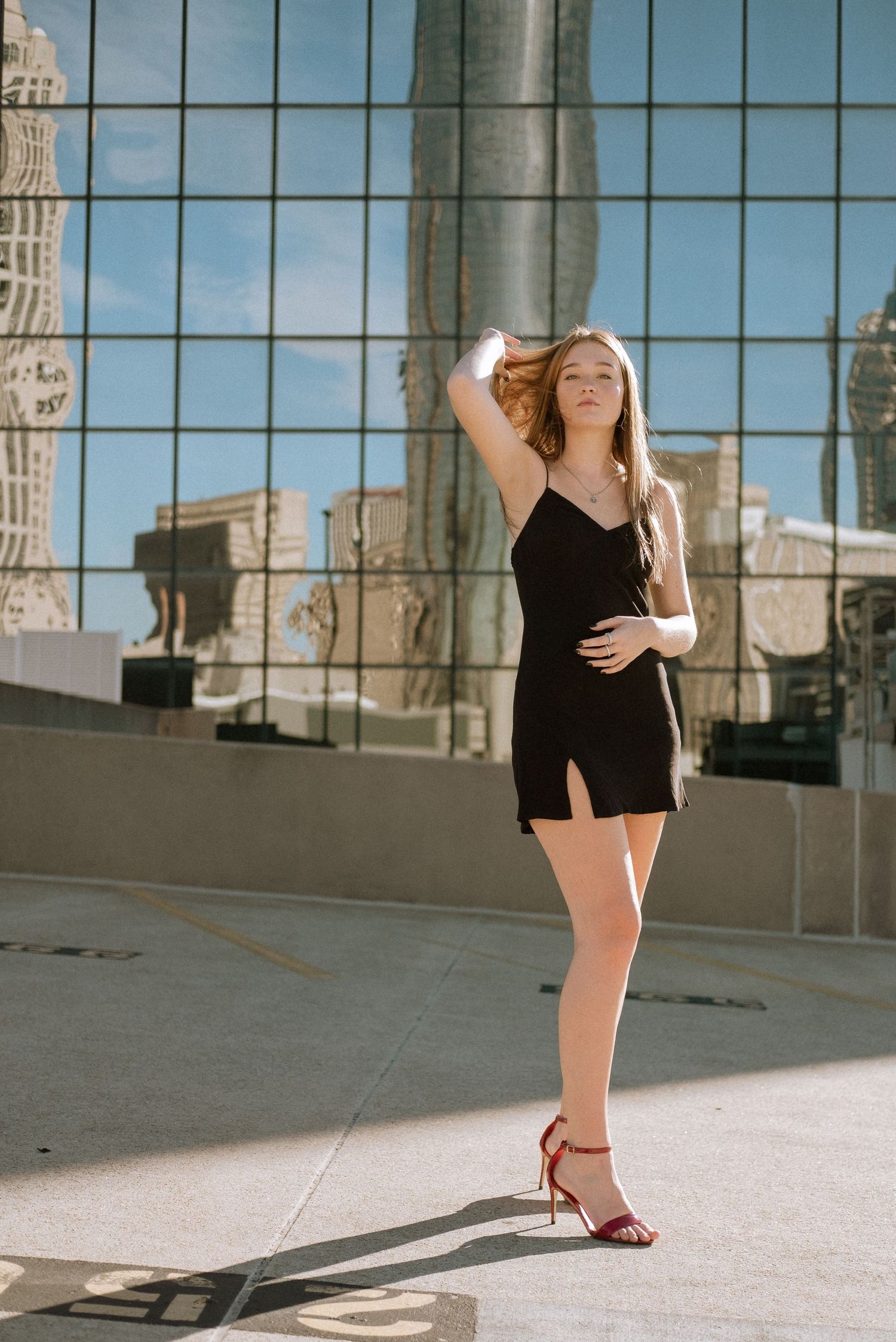 Photo of a high school senior with the Atlanta skyline