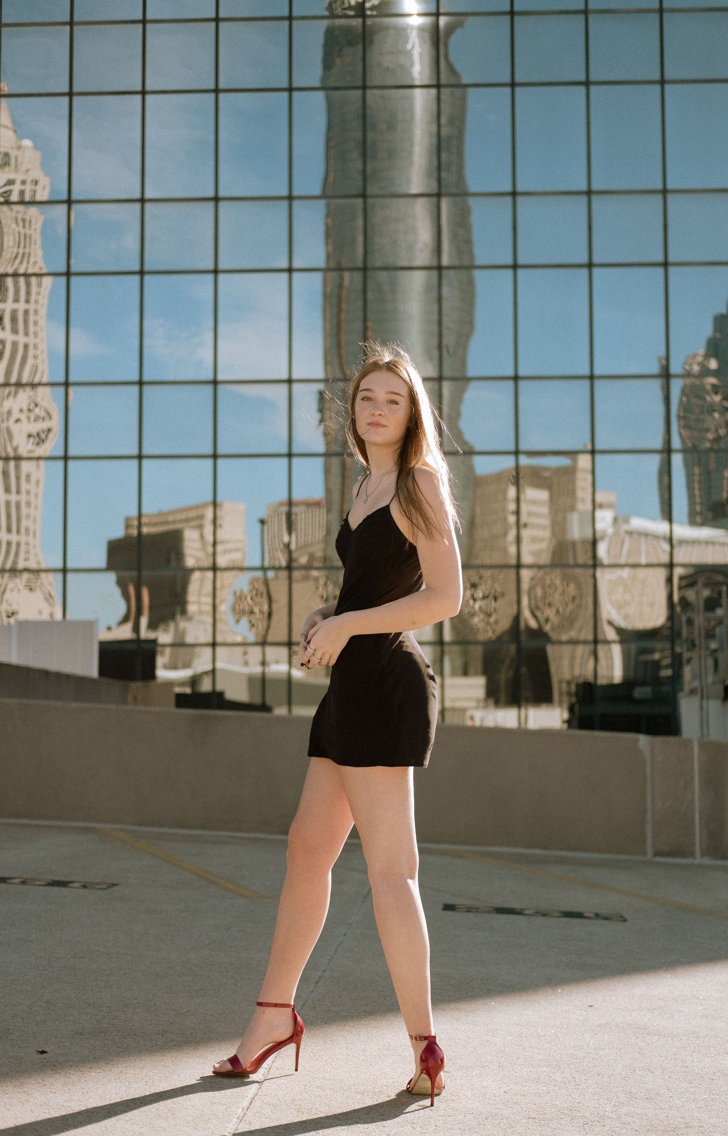 Photo of a high school senior with the Atlanta skyline