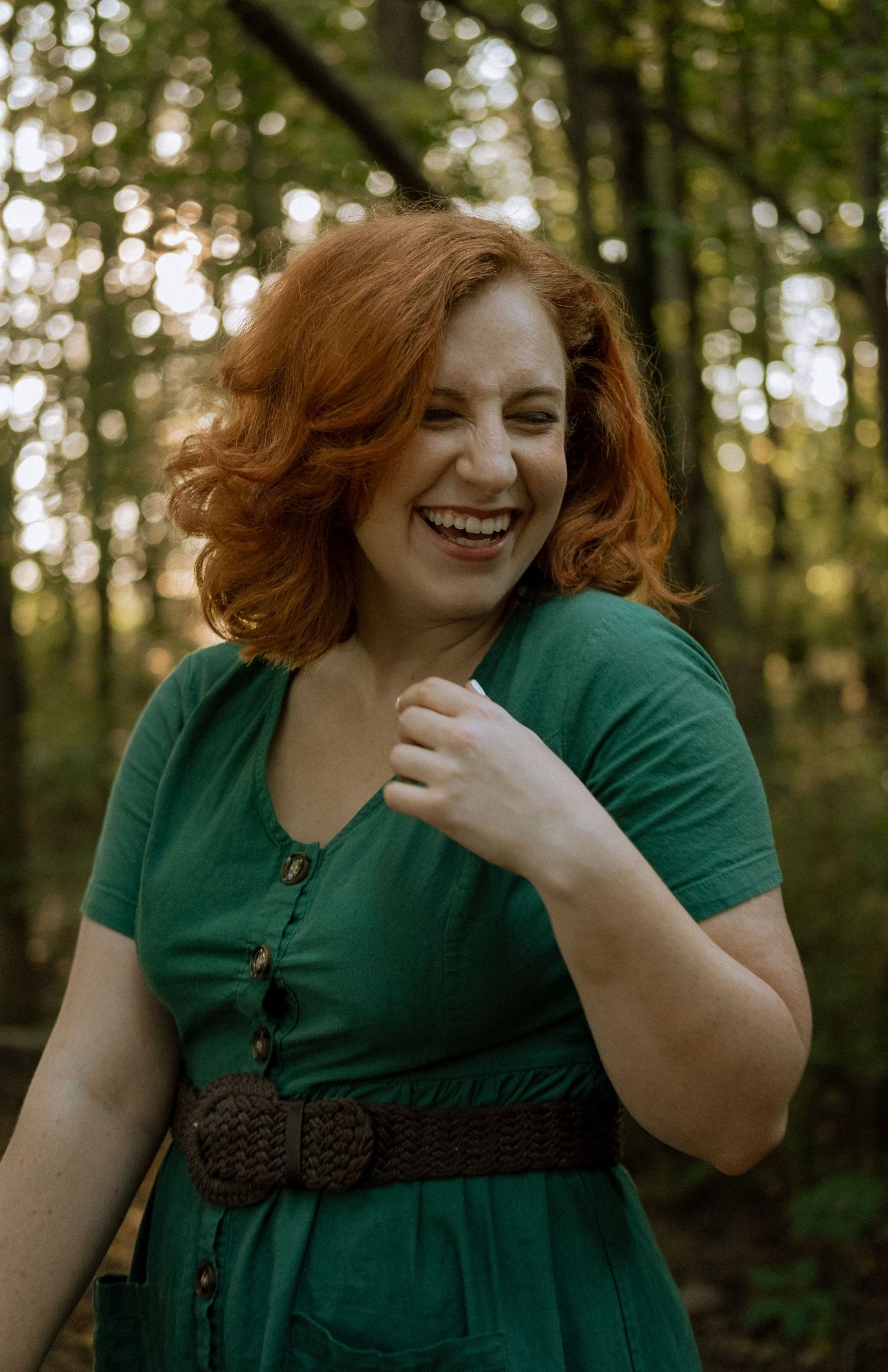 Photo of two girls in a forest wearing a vintage dress
