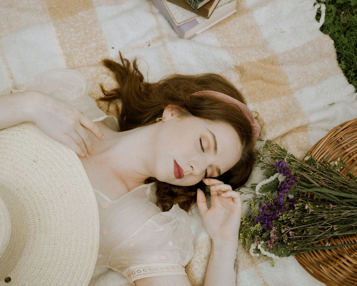 Photo of a girl in a garden wearing a vintage dress