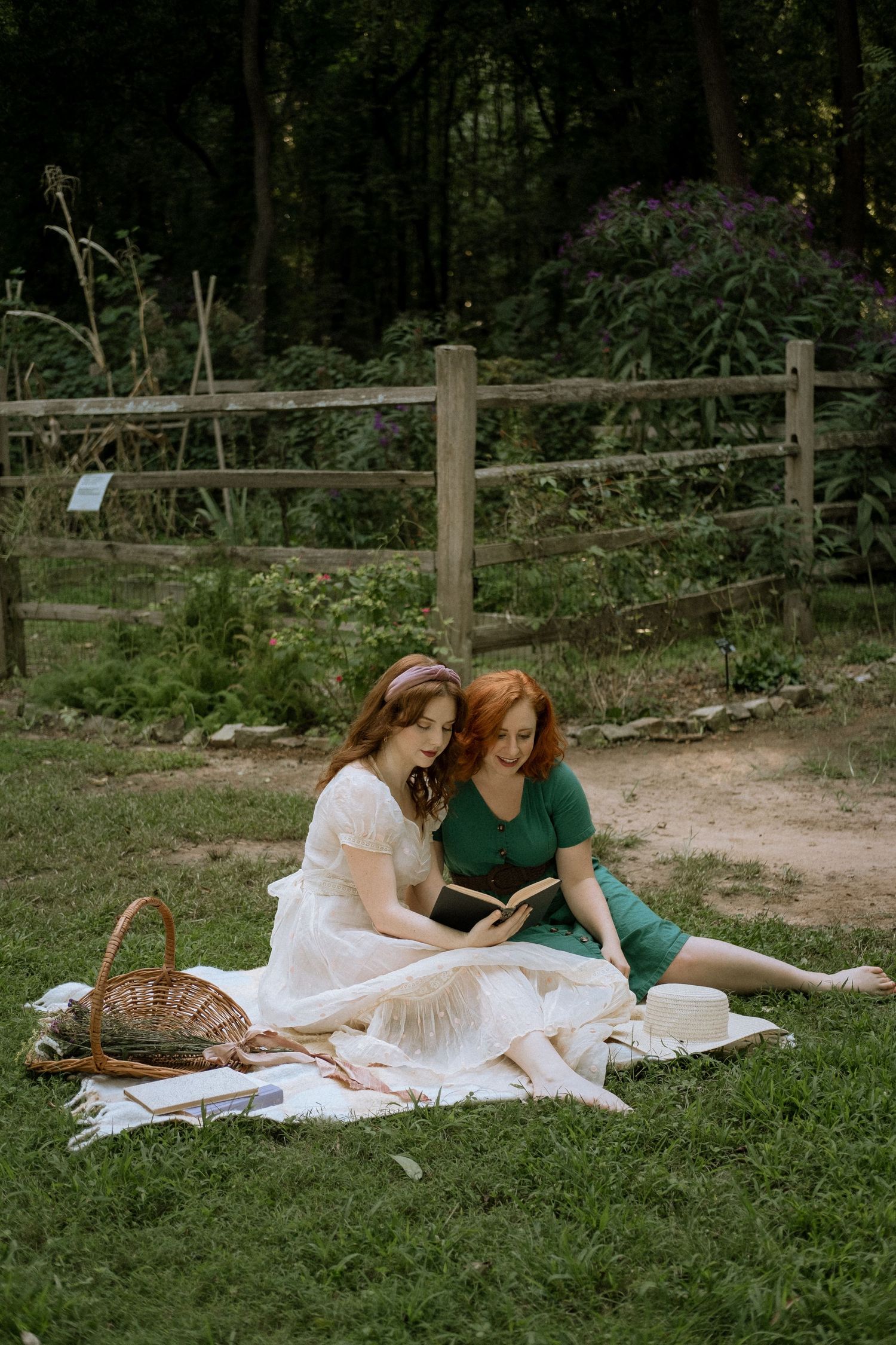 Photo of two girls in a garden wearing a vintage dress