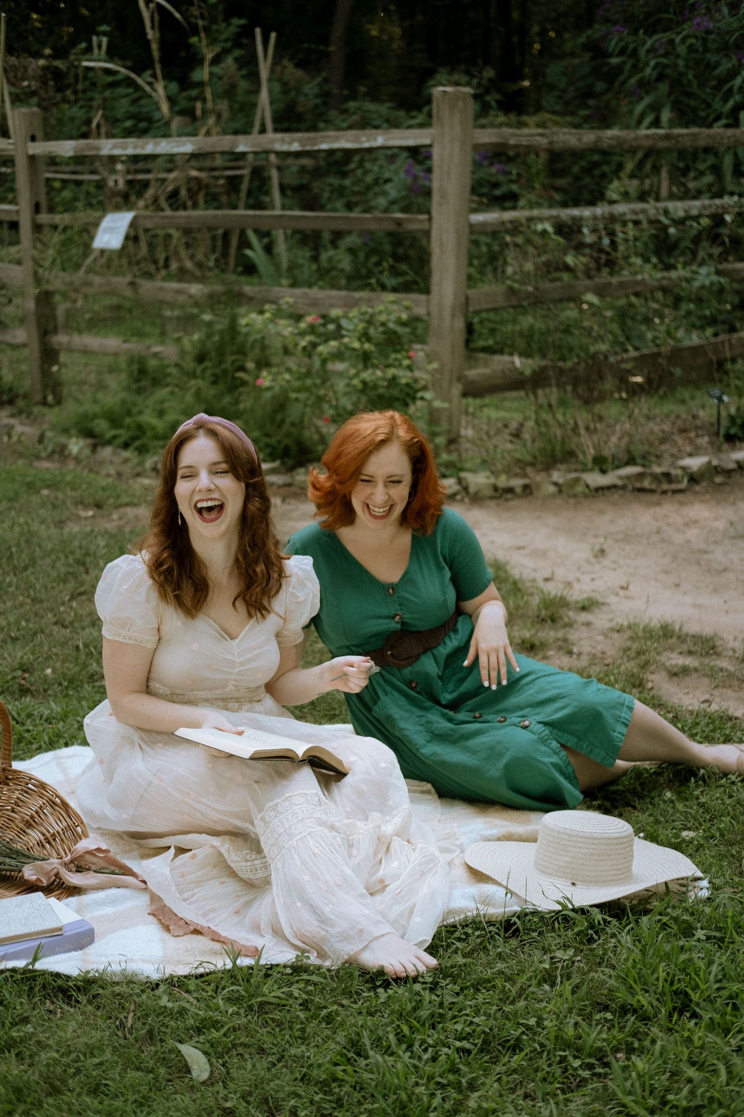 Photo of two girls in a garden wearing a vintage dress