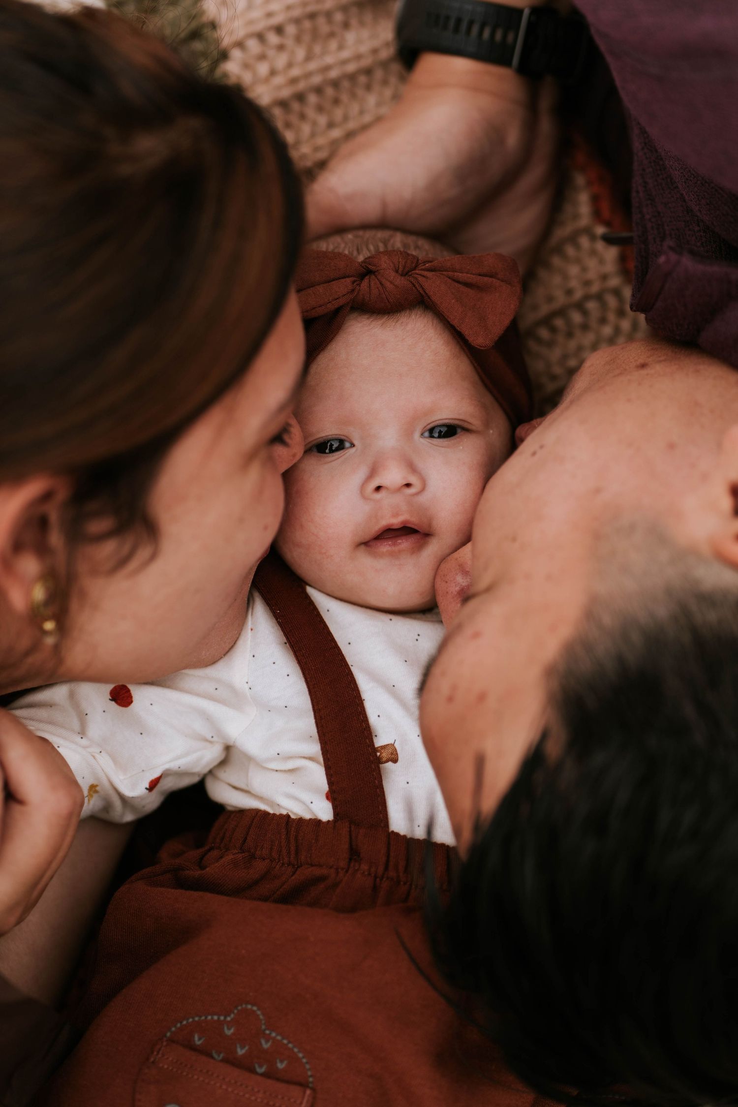 A series of tender family moments captured in warm brown tones showing affectionate interactions between loved ones.