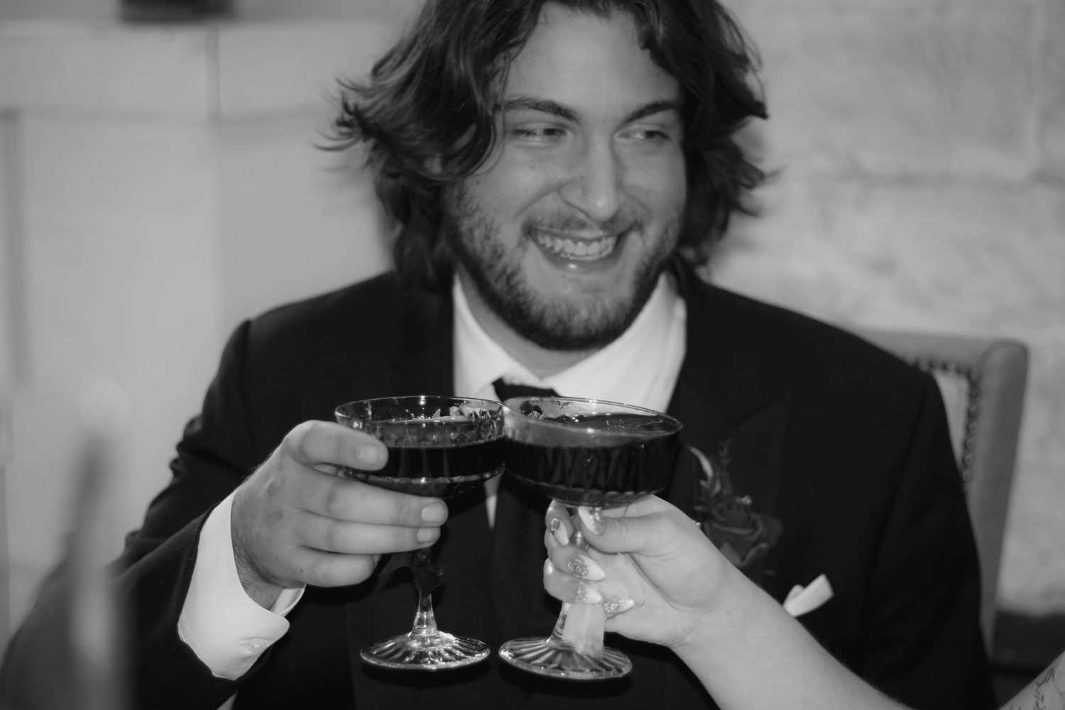 A series of candid reception photos showing guests enjoying champagne toasts.