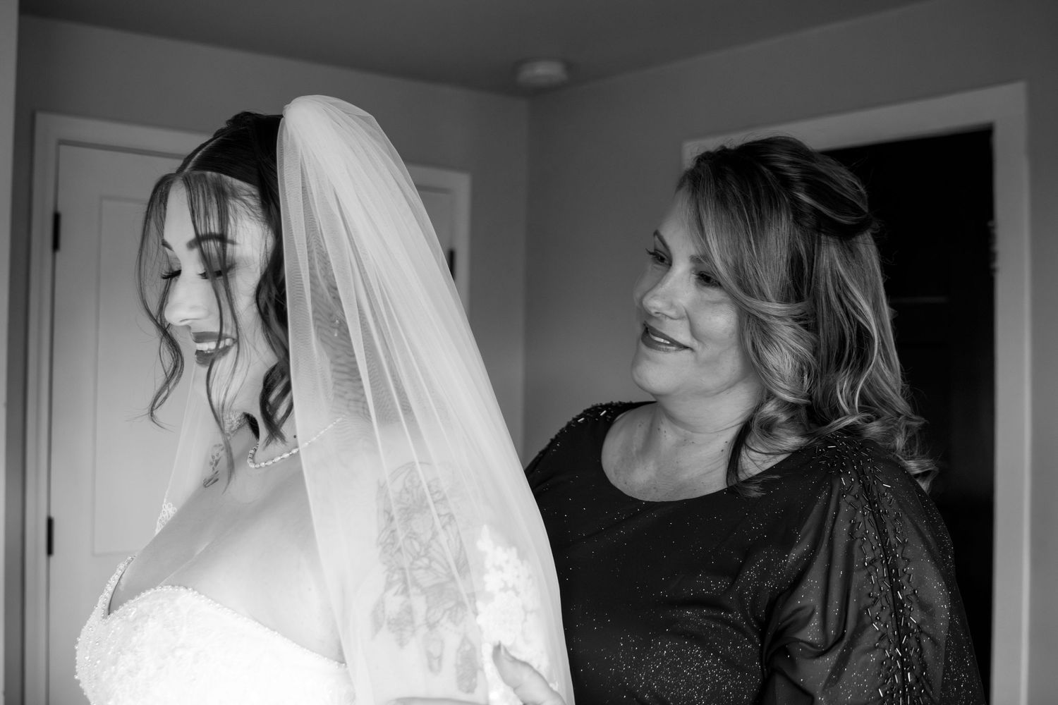 A series of black and white wedding photographs showing tender moments between a bride and groom.