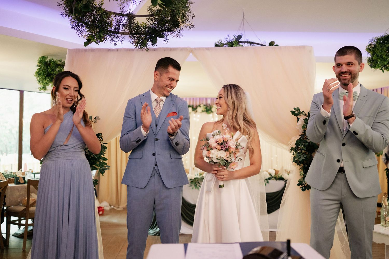 A wedding collage showing emotional moments and reactions during a ceremony in a light-filled venue.