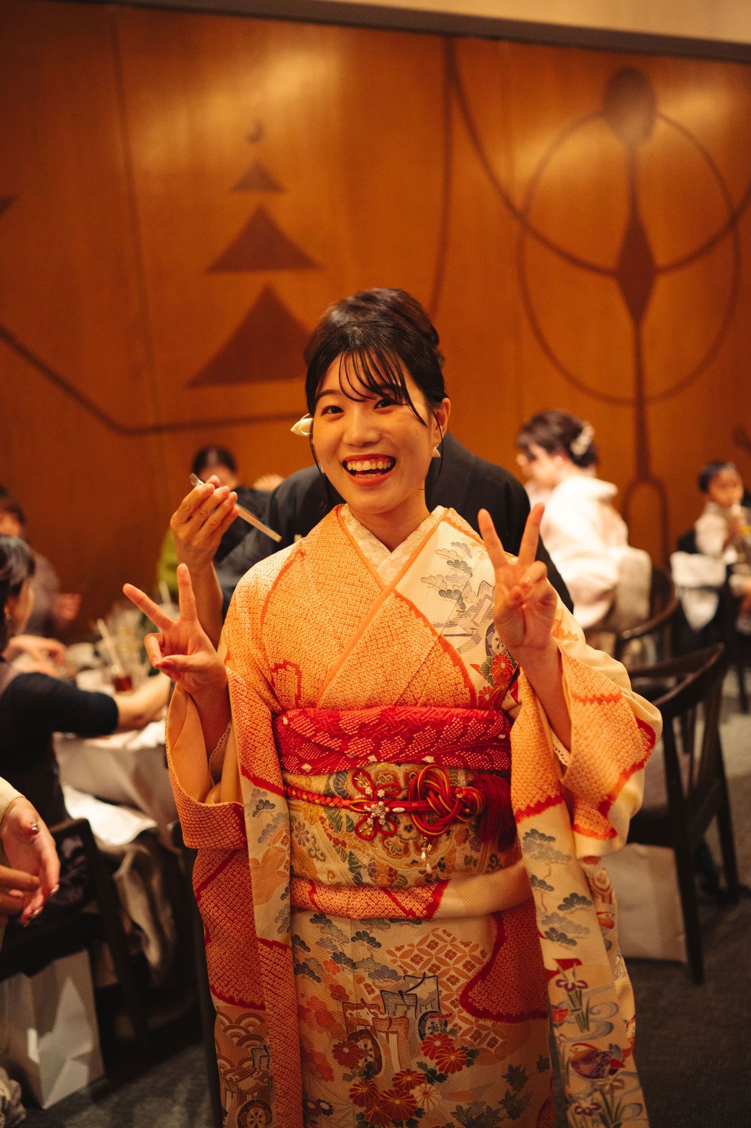 Traditional Japanese kimono-clad dancers perform in an elegant ballroom setting.