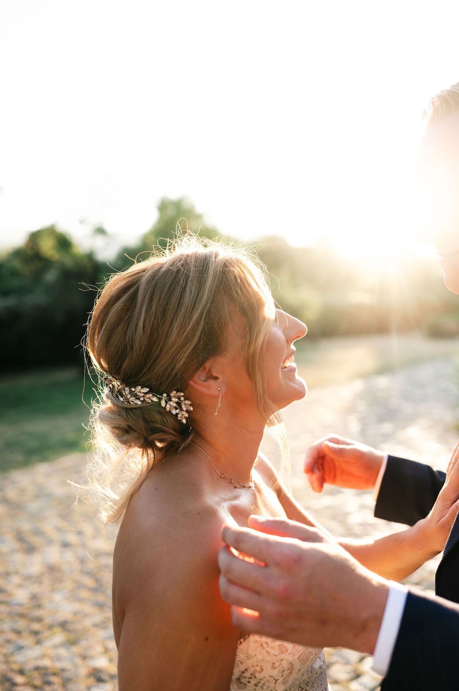 Romantic wedding portrait sequence showing close-up expressions in golden sunlight.