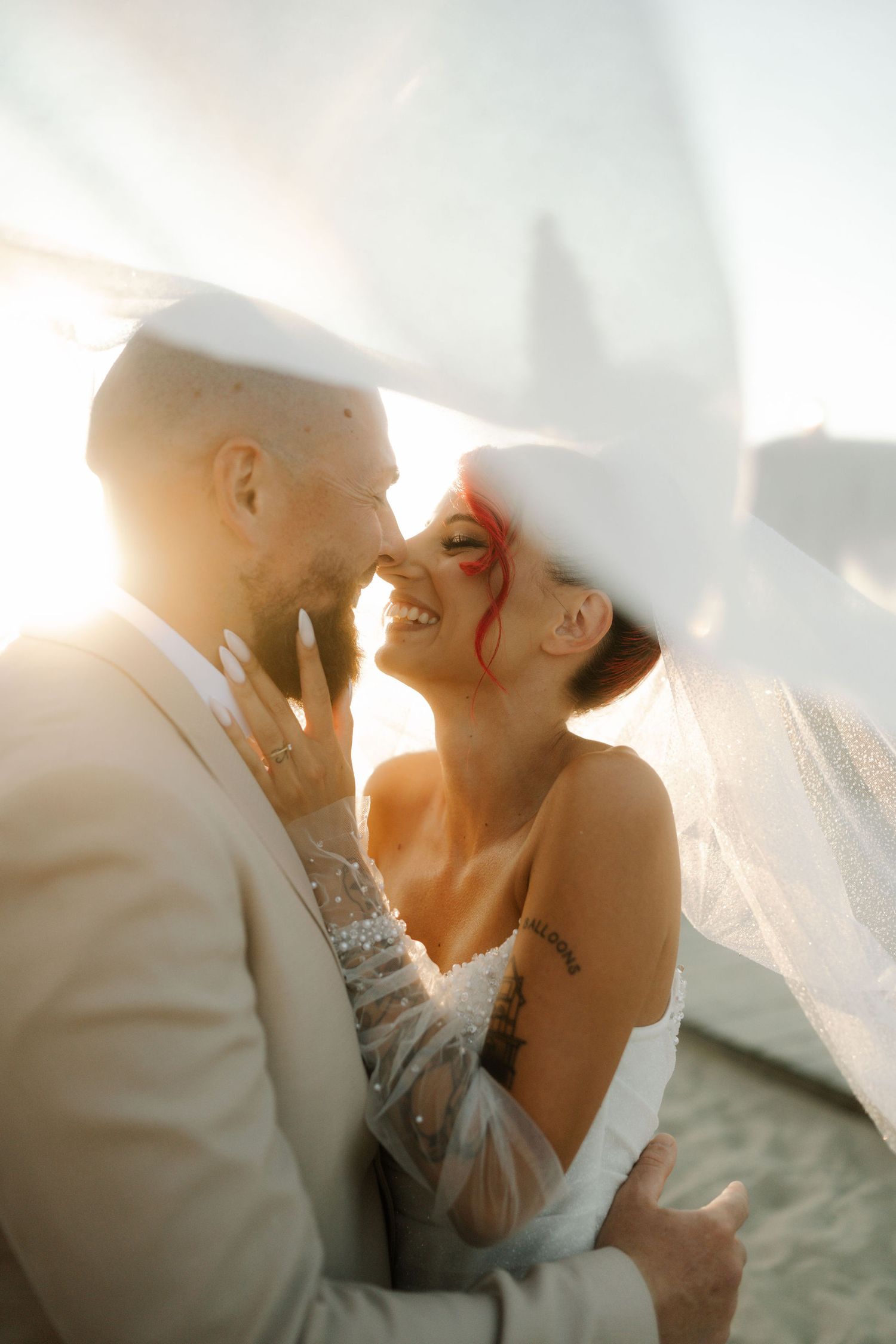 A romantic beach wedding photo sequence showing tender moments between newlyweds at sunset.