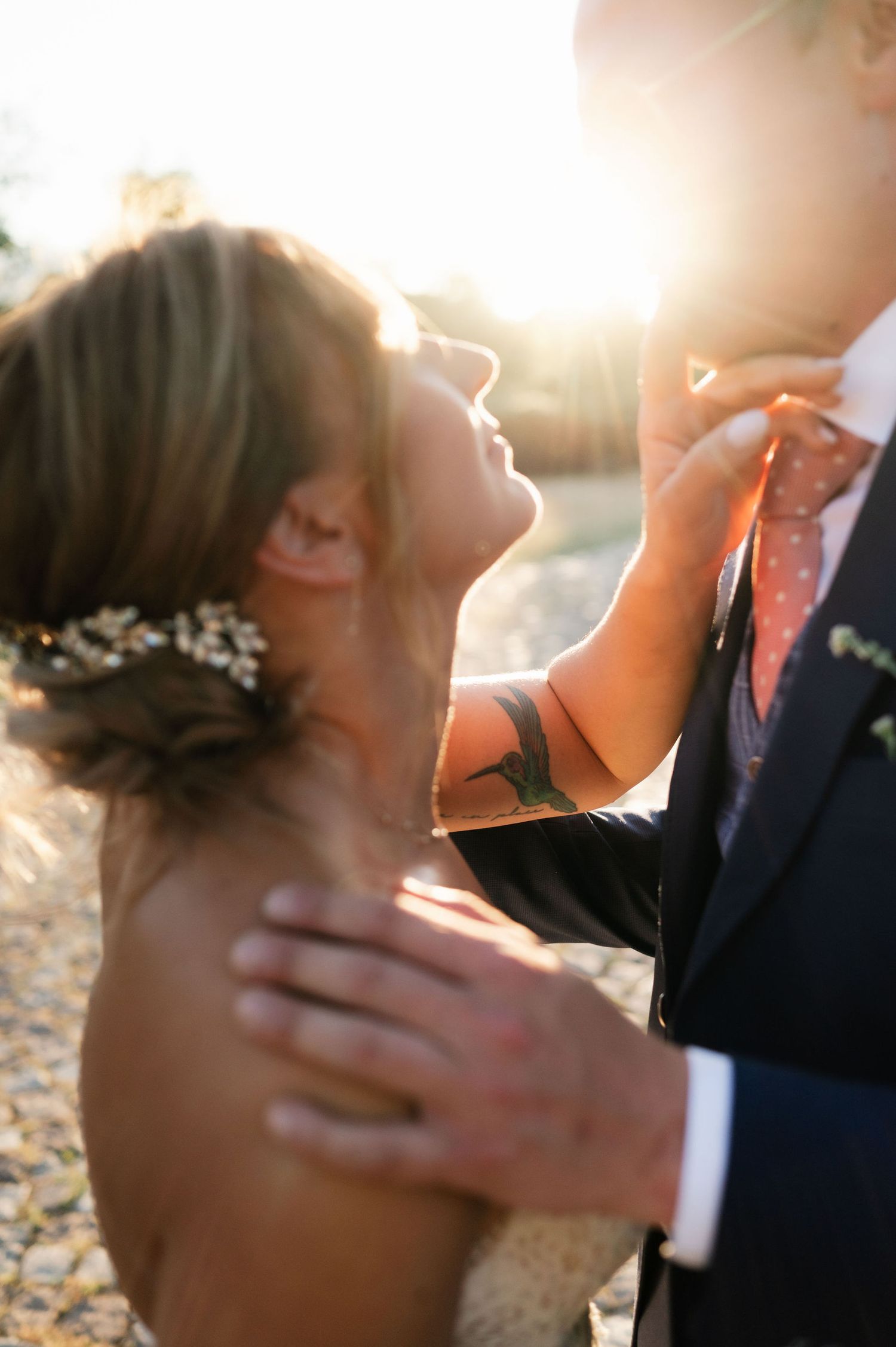 Soft focus wedding portraits showing tender moments between newlyweds.