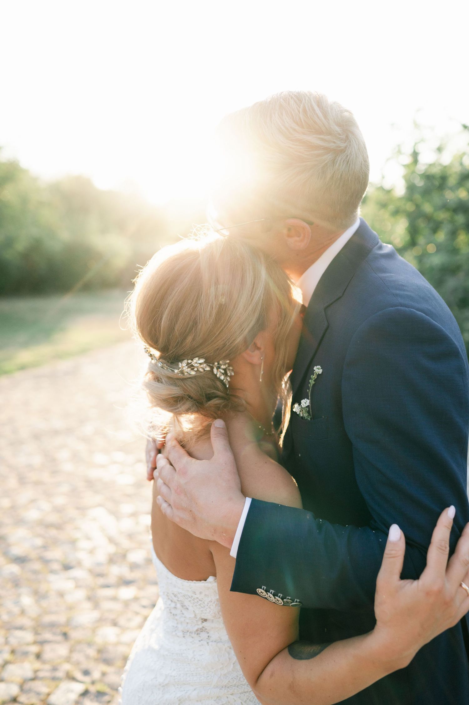 Tender wedding moment captured in multiple frames during sunset.