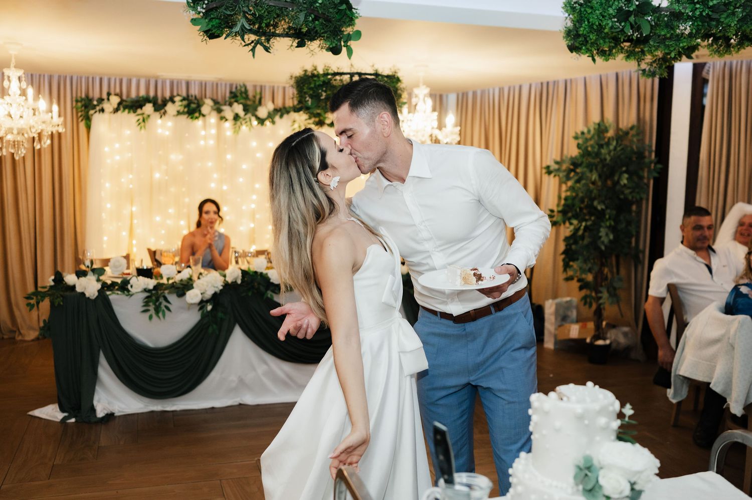 Newlyweds share a joyful moment on the dance floor during their wedding reception celebration.
