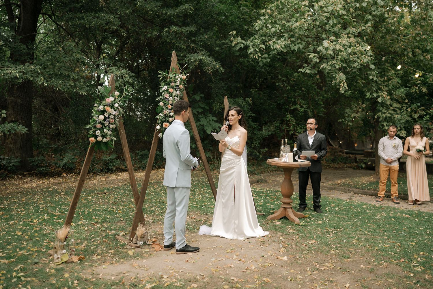 A series of outdoor wedding ceremony moments captured in a wooded garden setting with natural greenery.