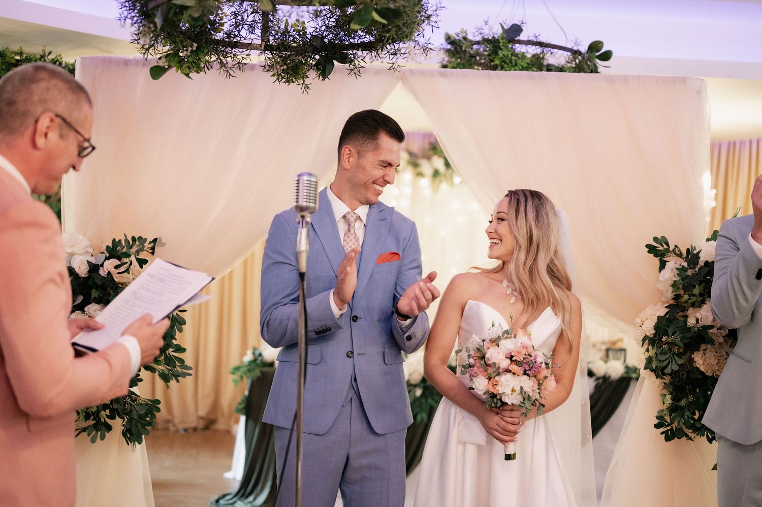 A series of wedding photos showing joyful moments between couples during an indoor ceremony with floral decorations.