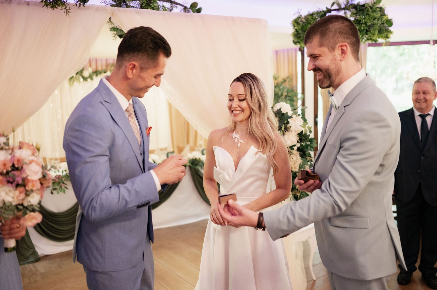 Wedding ceremony moments captured in a series of romantic photos showing rings, hands, and intimate gestures.