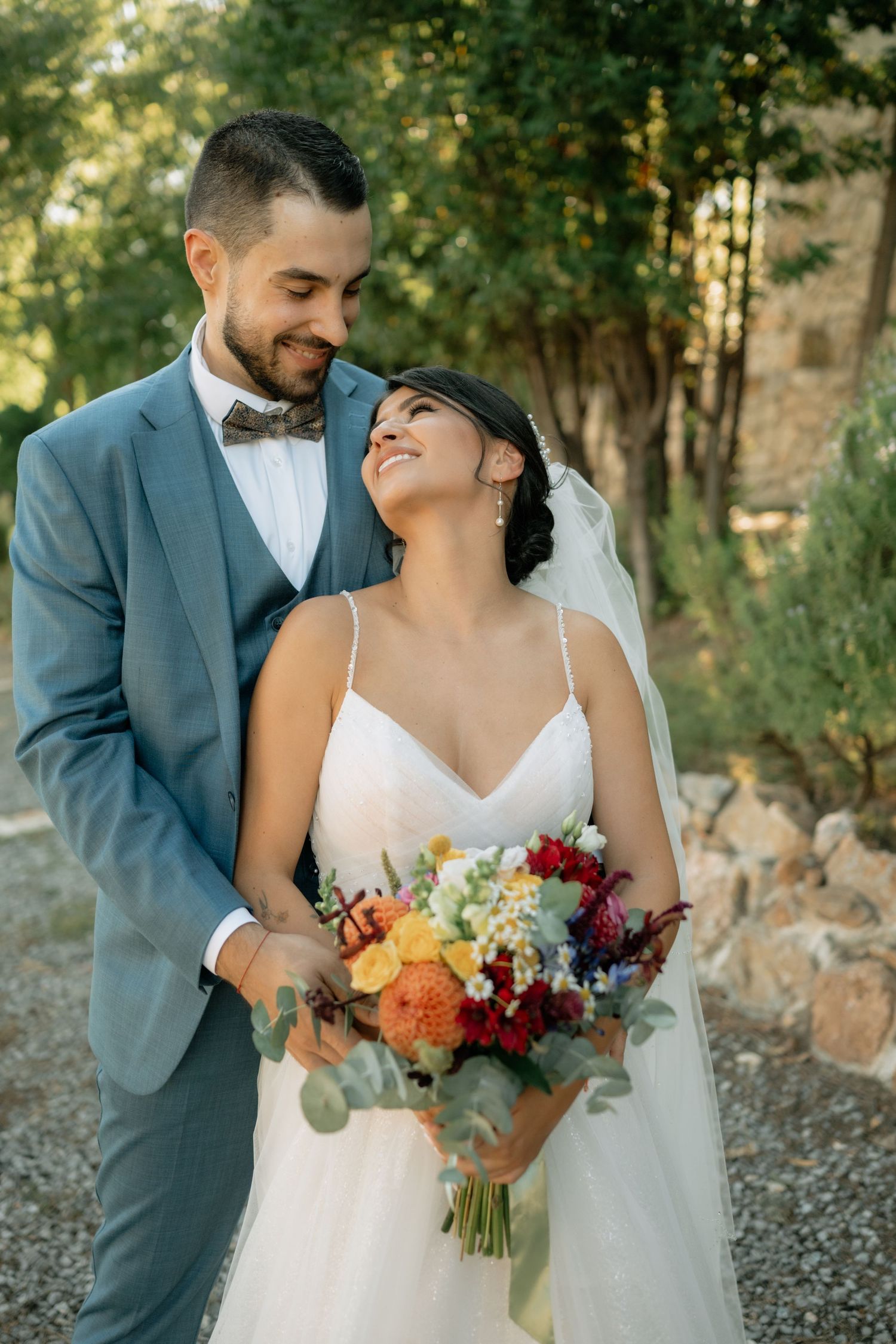 A series of intimate wedding moments captured in a natural outdoor setting with warm lighting and floral details.
