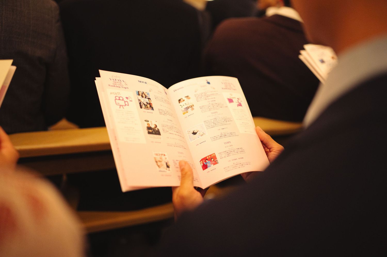 Open notebook or program showing handwritten notes and small illustrations.