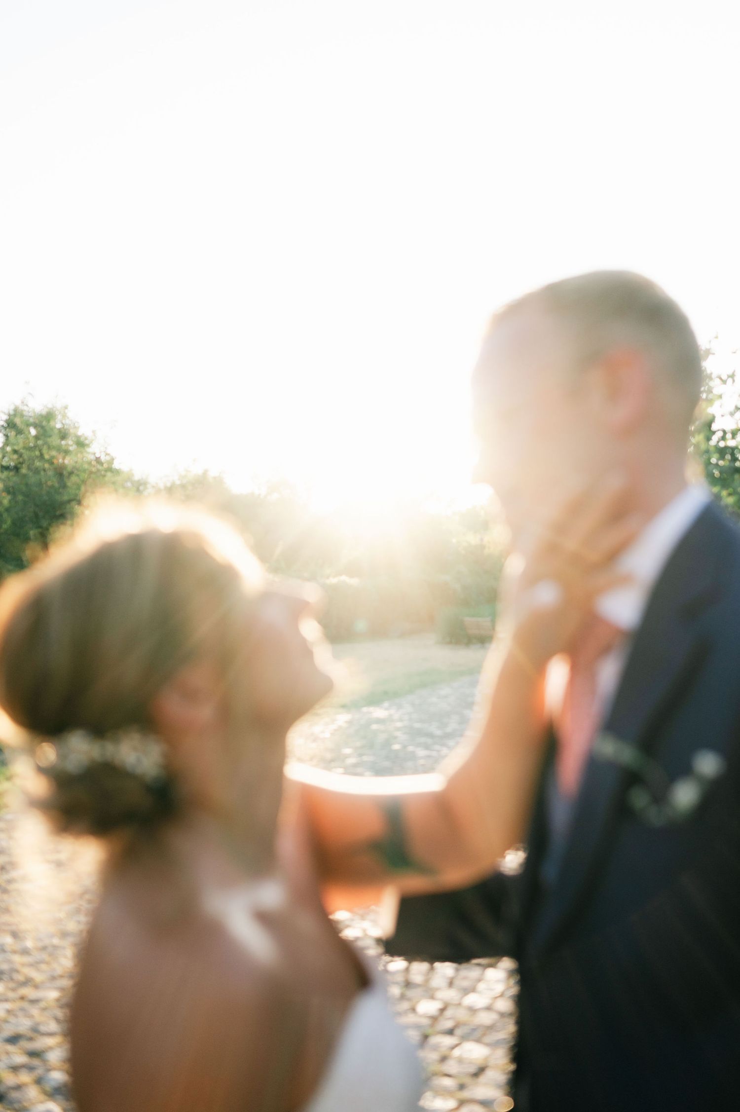 Dreamy sequence of wedding photos showing couple's intimate interaction at sunset.