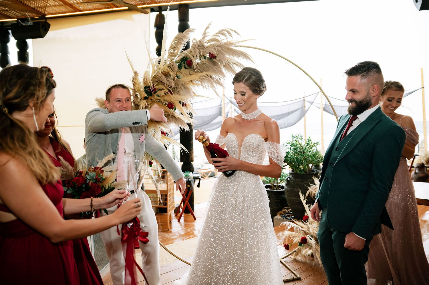 Wedding ceremony moments captured in a modern venue with rustic elements.
