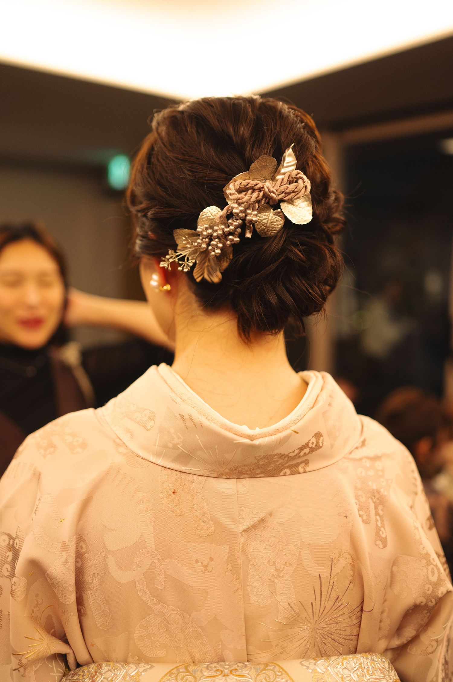 Elegant hair accessories and decorative details on traditional wedding attire.