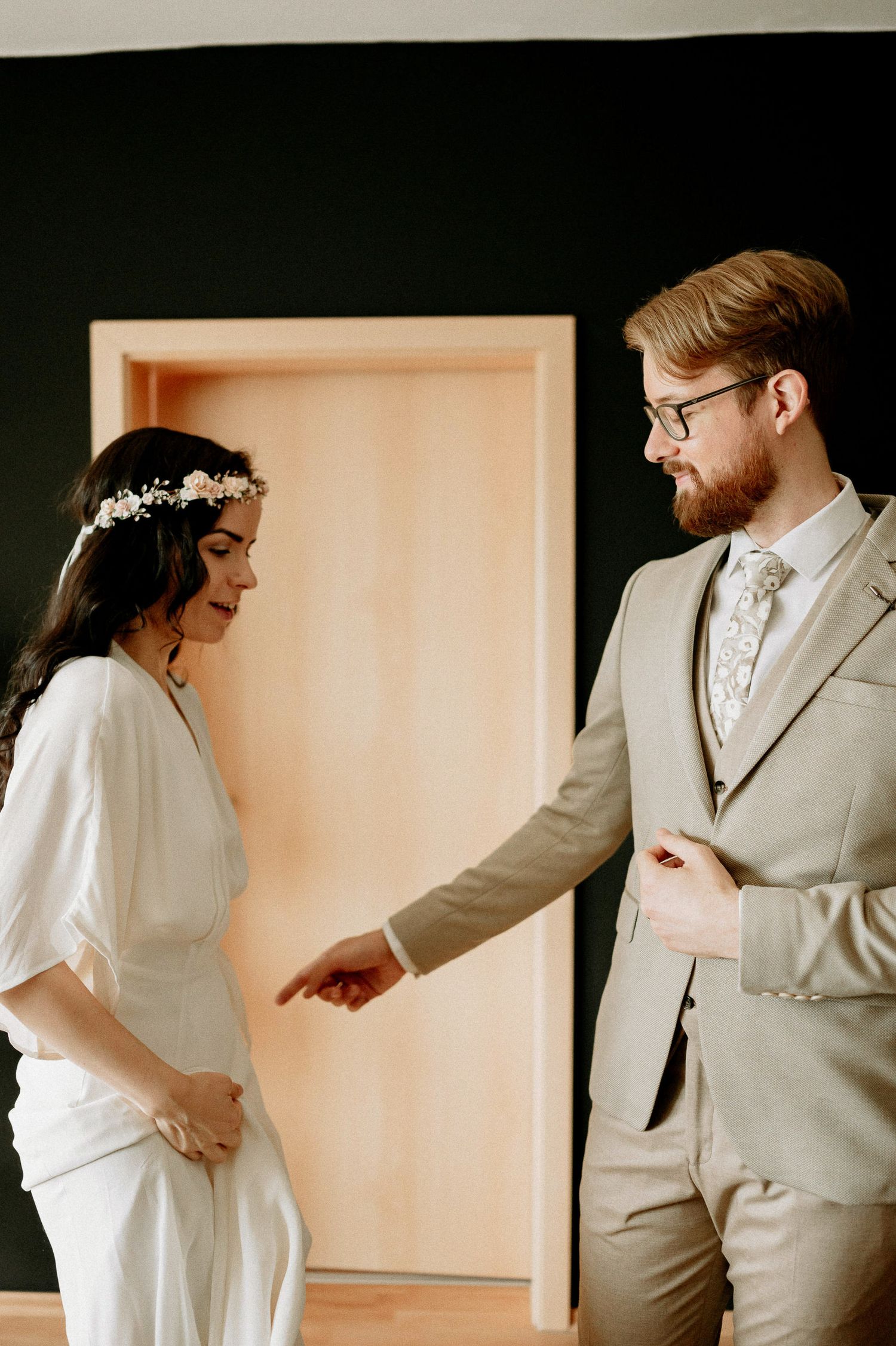 Artistic wedding photography series capturing intimate dance movements in a minimal space.