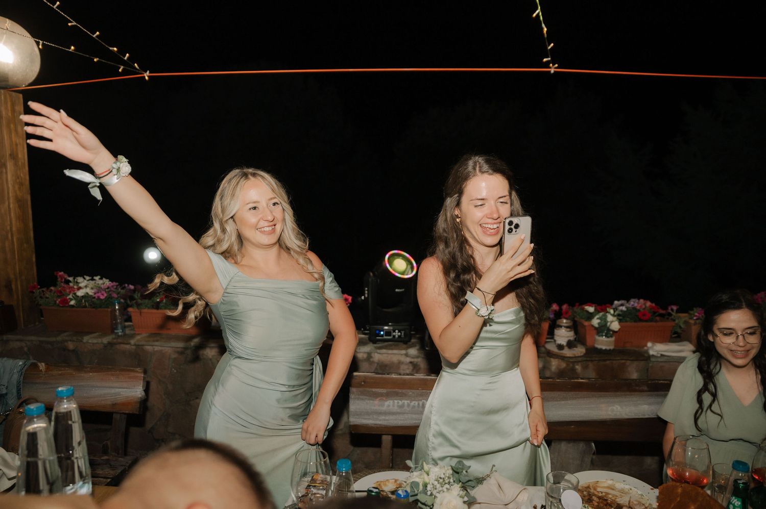 A series of candid dance floor photos showing people celebrating and dancing at a festive indoor event.