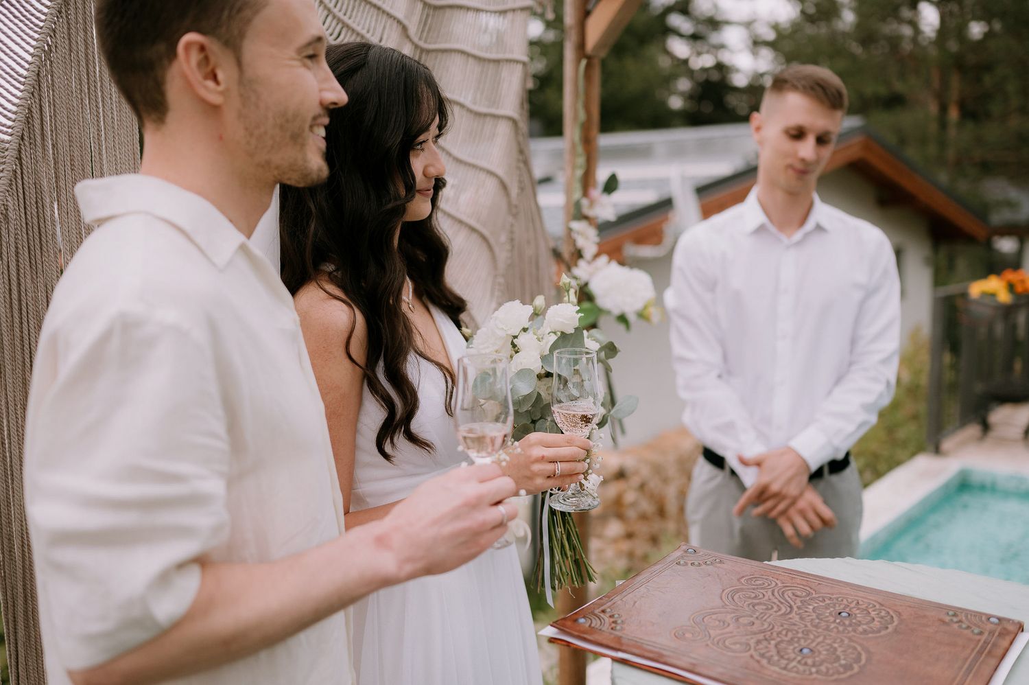 Outdoor celebration setup with champagne glasses and decorative elements.