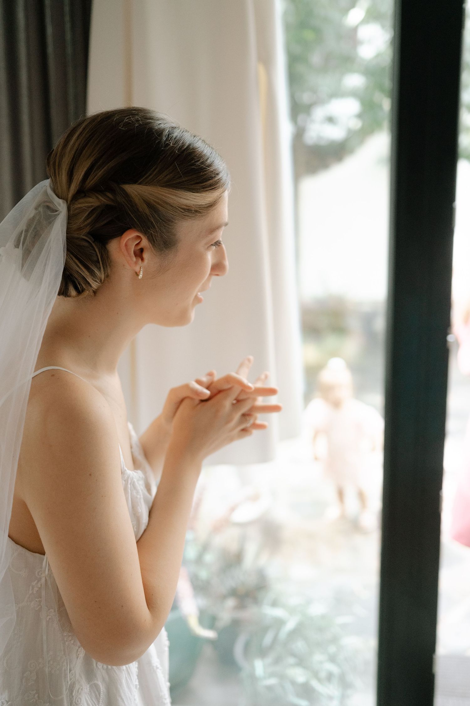 A dreamy triptych of a bride in her wedding veil looking out a window in soft natural light.