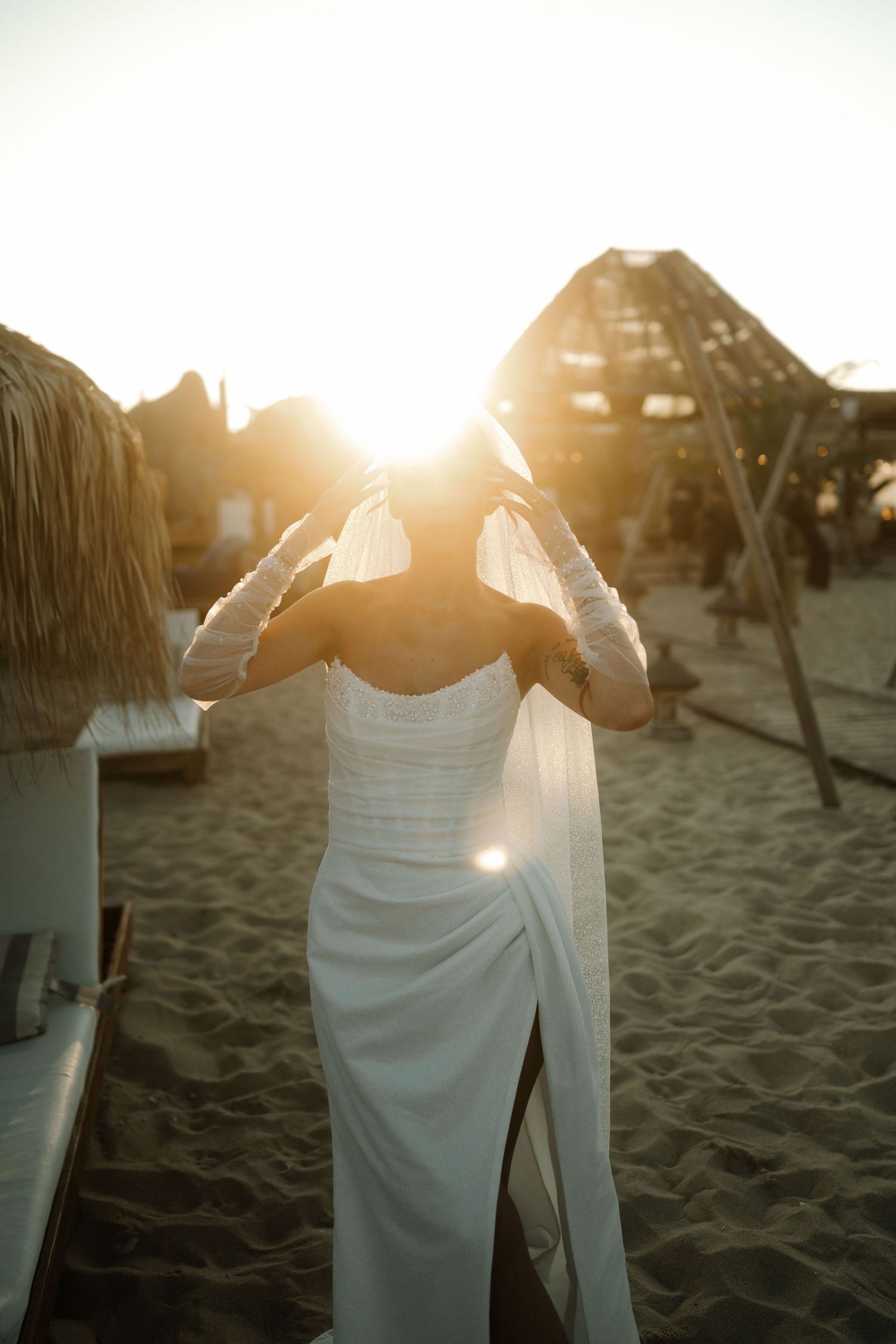 Series of sunset beach photos showing someone in a flowing white dress against golden sunlight and sand.